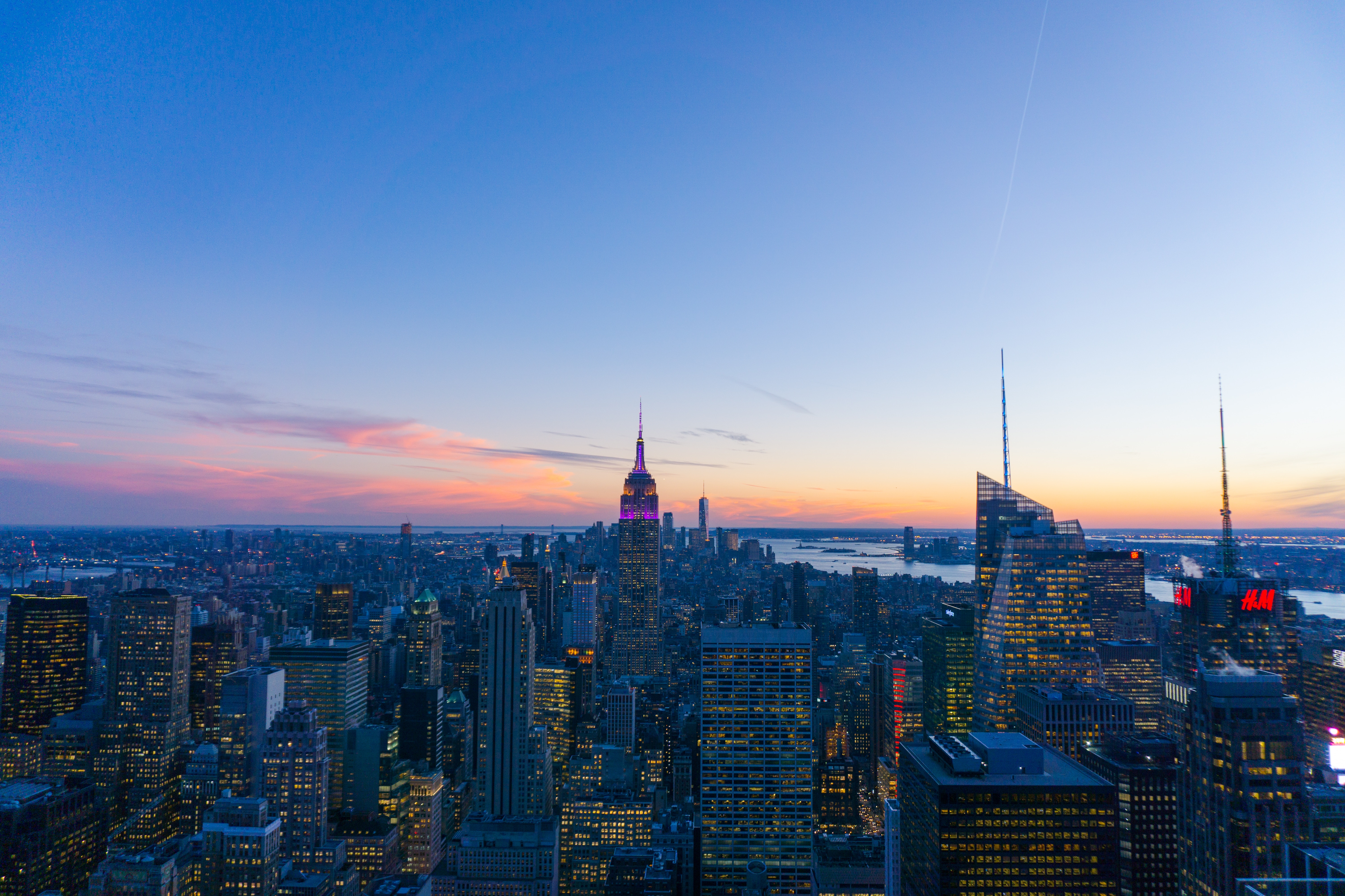 New York City skyline at dusk with Empire State Building HD Wallpaper