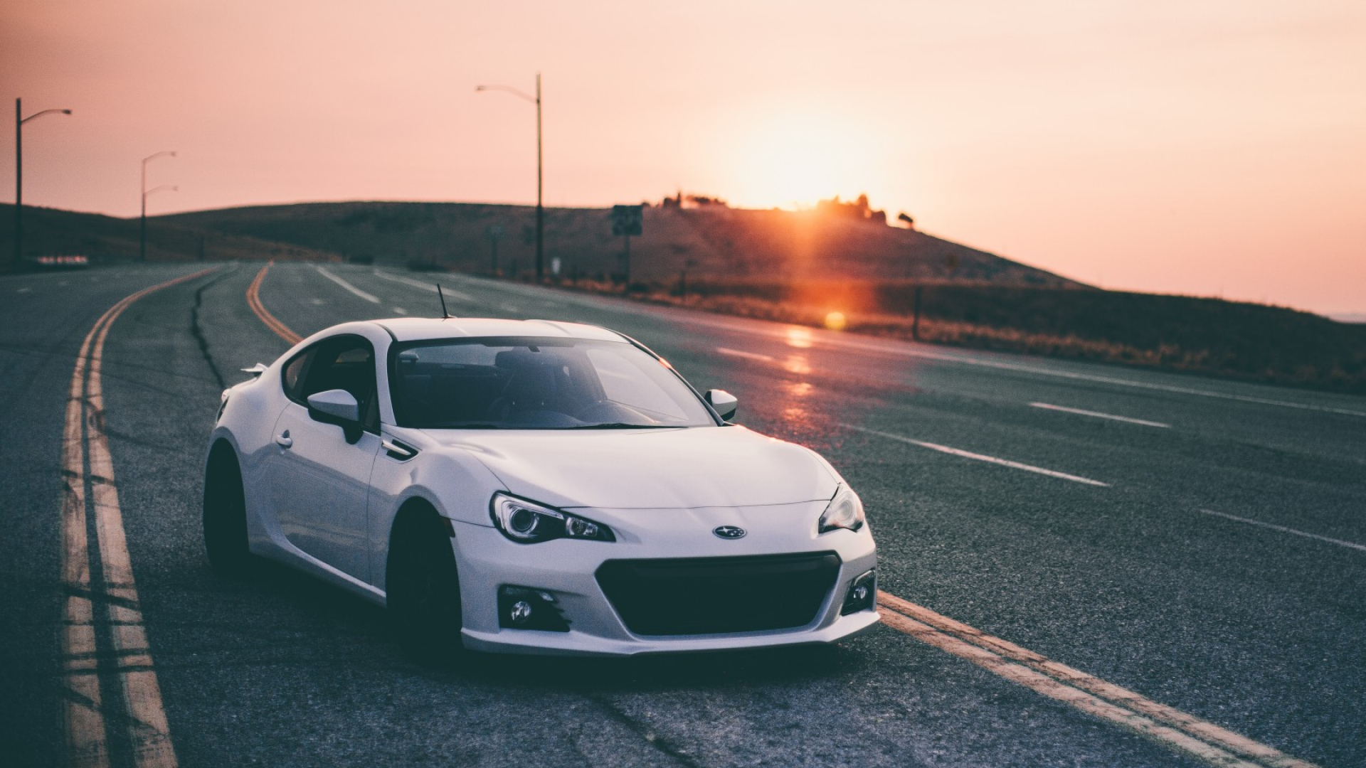 White Subaru BRZ on a winding road at sunset HD Wallpaper