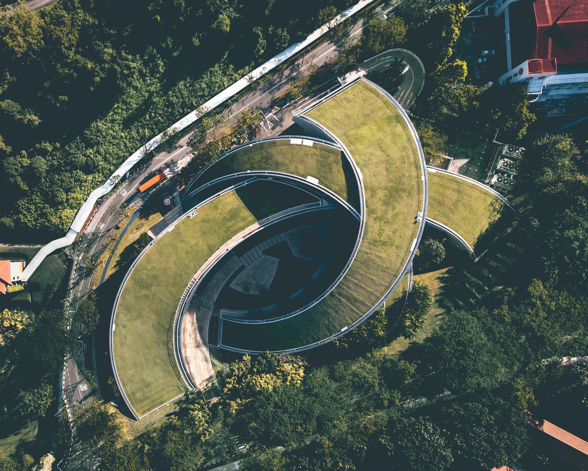 Aerial view of the School of Art, Design and Media at Nanyang Technological University, Singapore HD Wallpaper