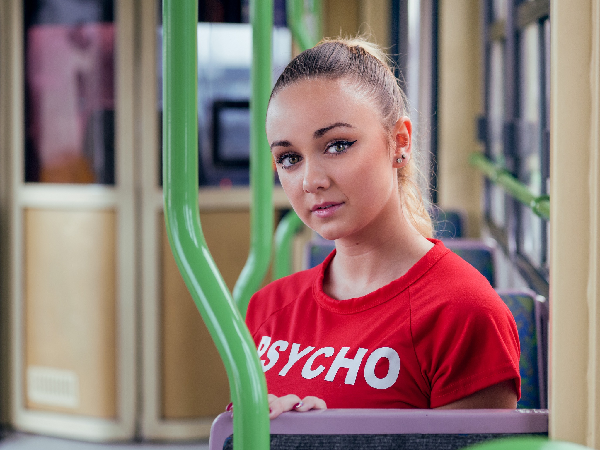Woman with ponytail wearing a red shirt HD Wallpaper