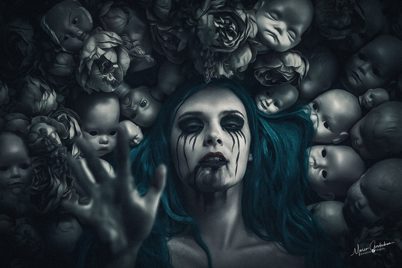 Woman surrounded by doll heads and flowers HD Wallpaper
