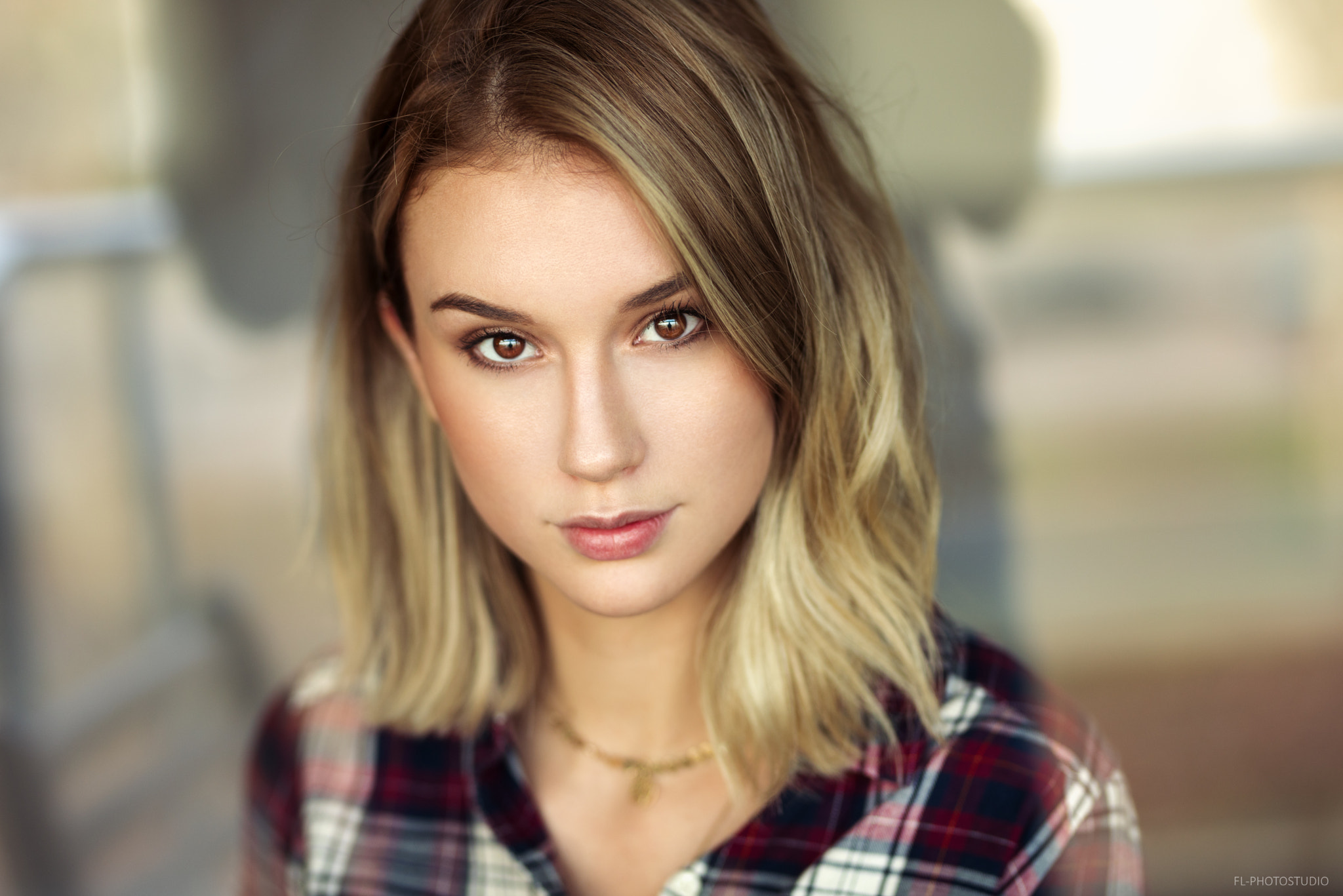 Portrait of a woman with blonde hair wearing a plaid shirt HD Wallpaper