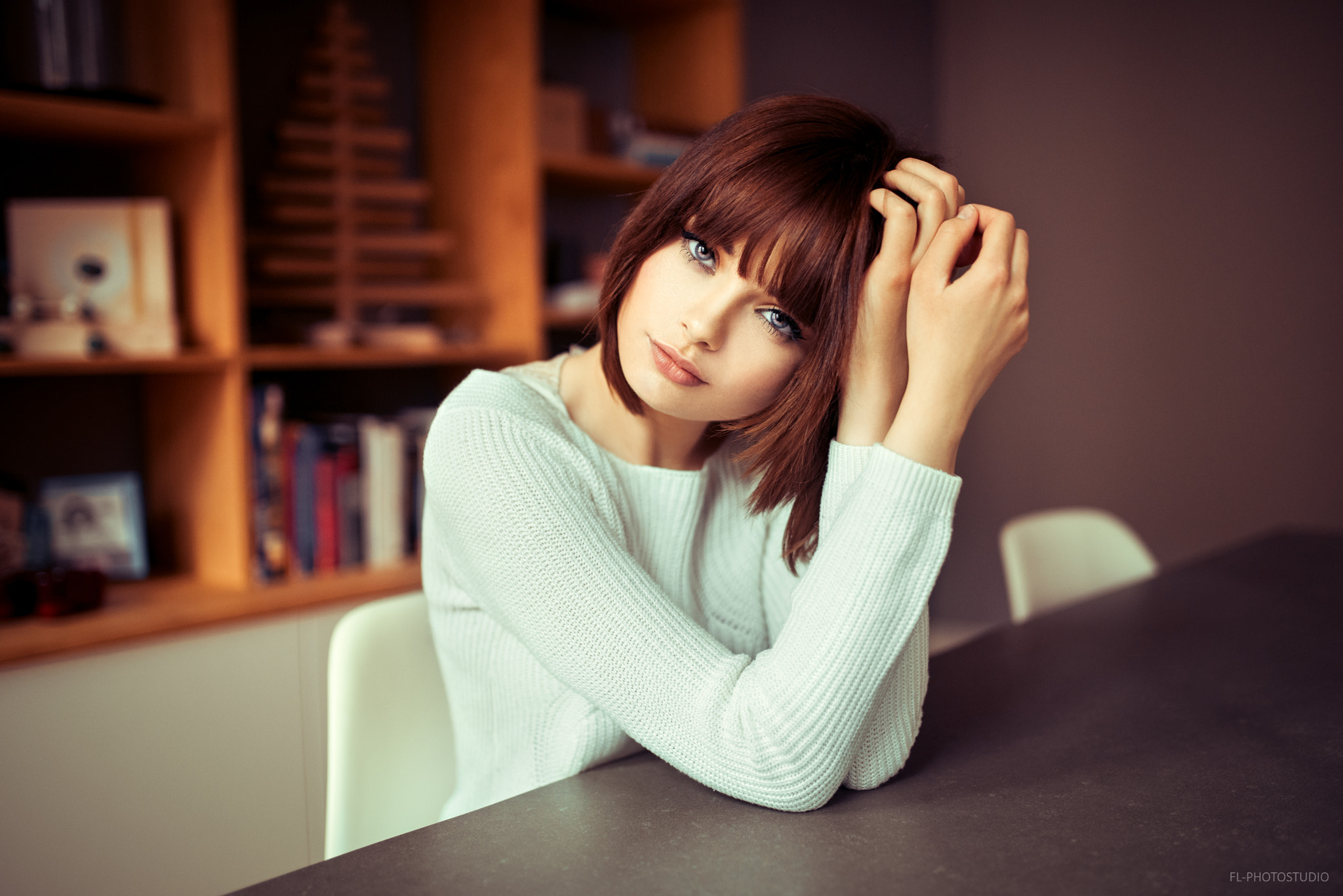 Portrait of Marie Grippon sitting at a table HD Wallpaper