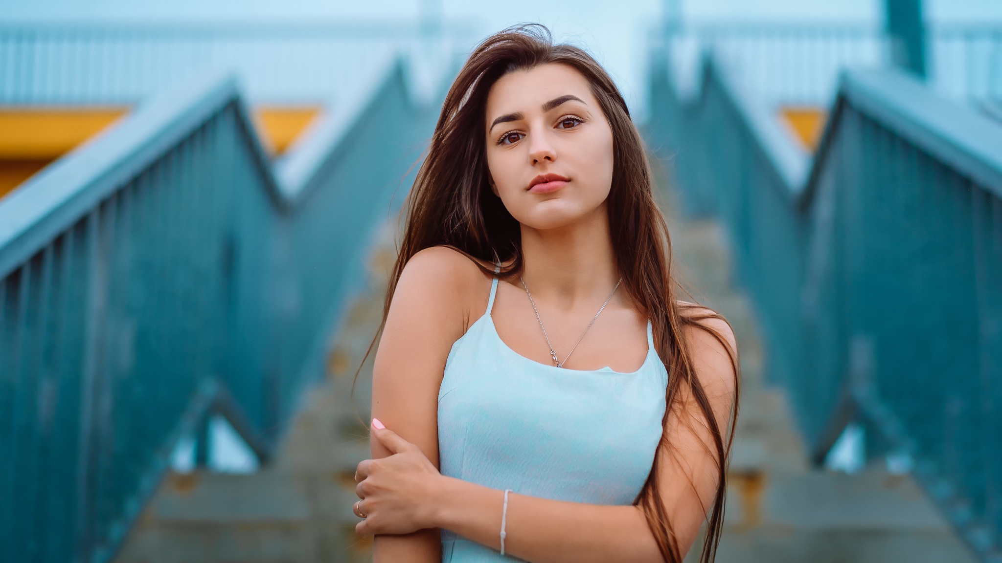 Woman in a light blue dress on stairs HD Wallpaper