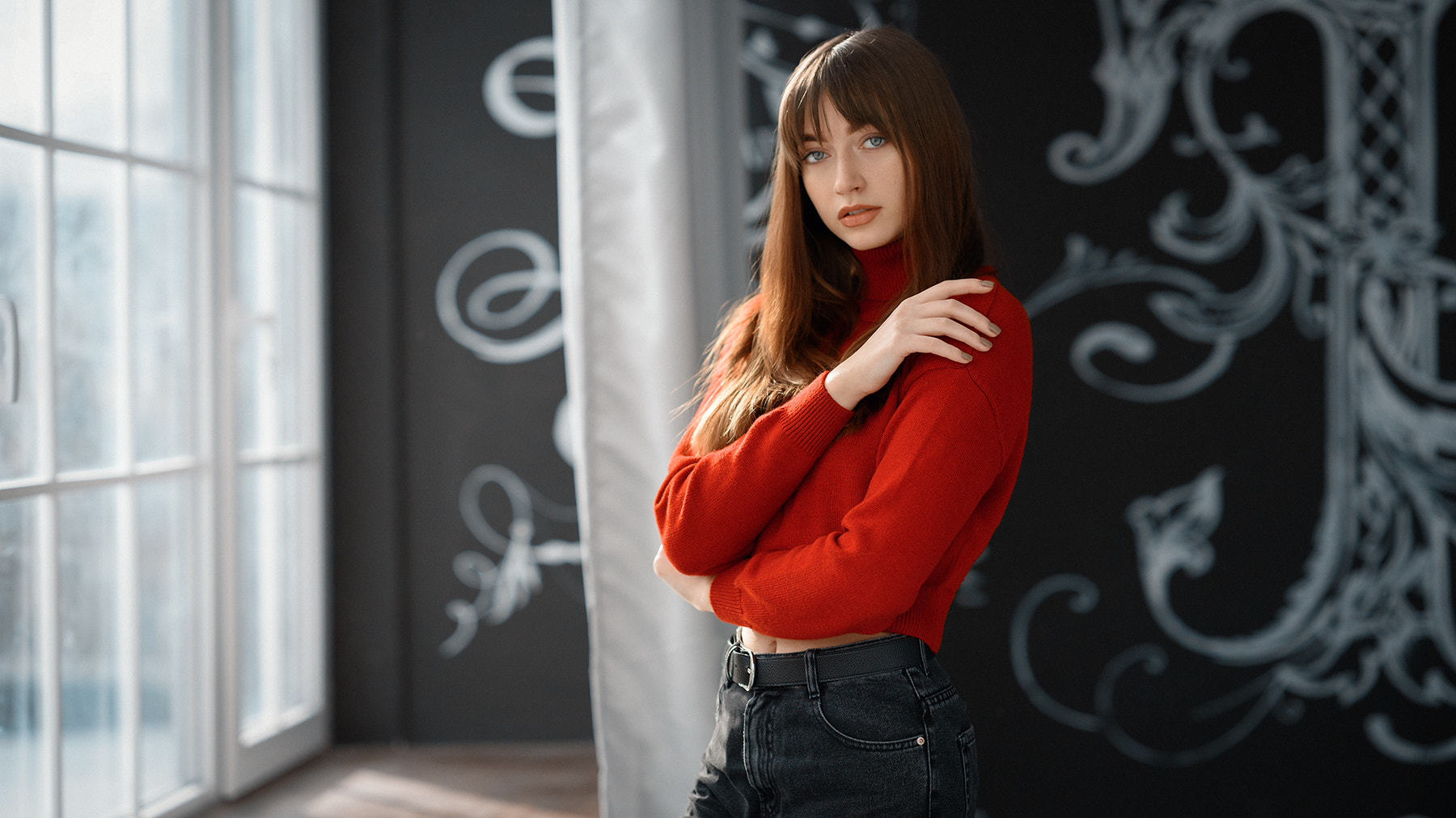 Woman in red turtleneck and jeans HD Wallpaper