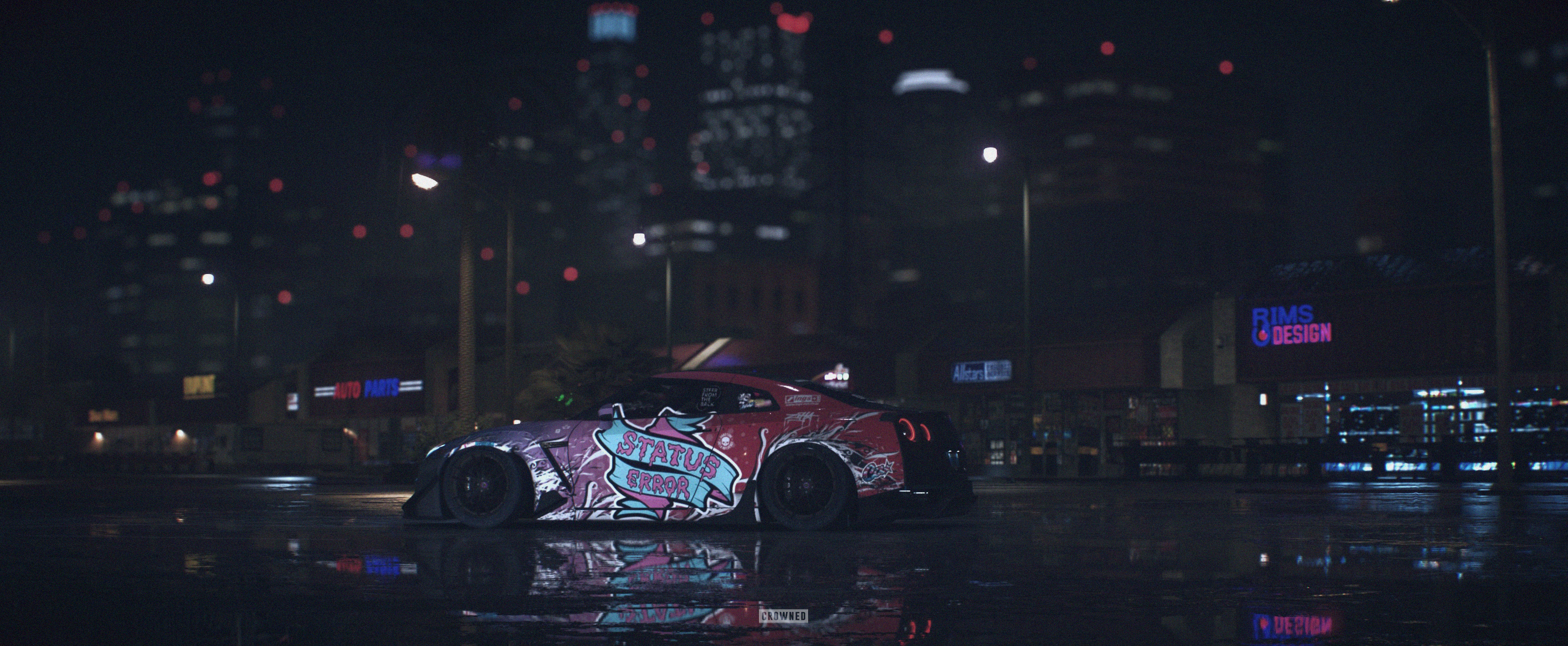 Nissan GTR with "STATUS CROWNED" livery at night HD Wallpaper