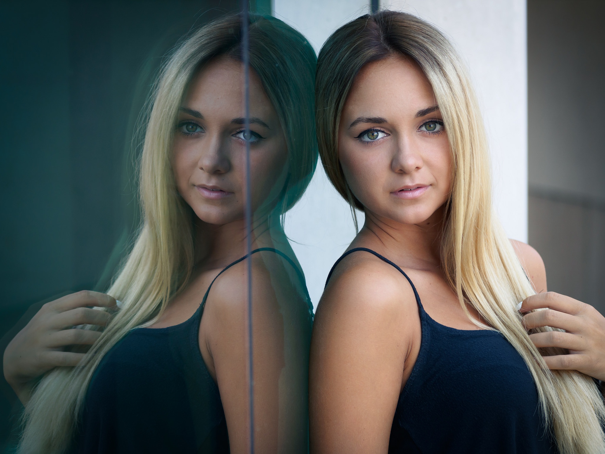 Woman with blonde hair and green eyes reflected in glass HD Wallpaper