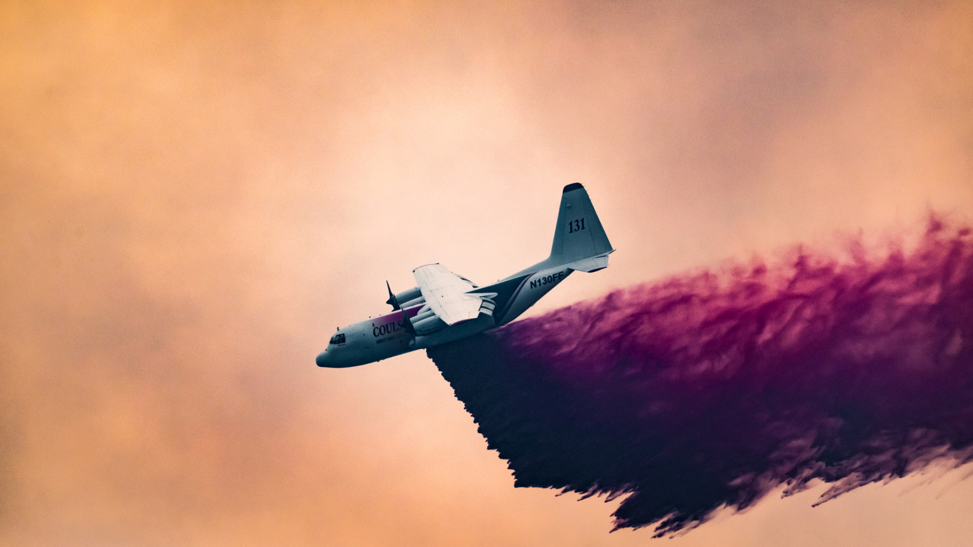 C-130 aircraft dropping retardant HD Wallpaper