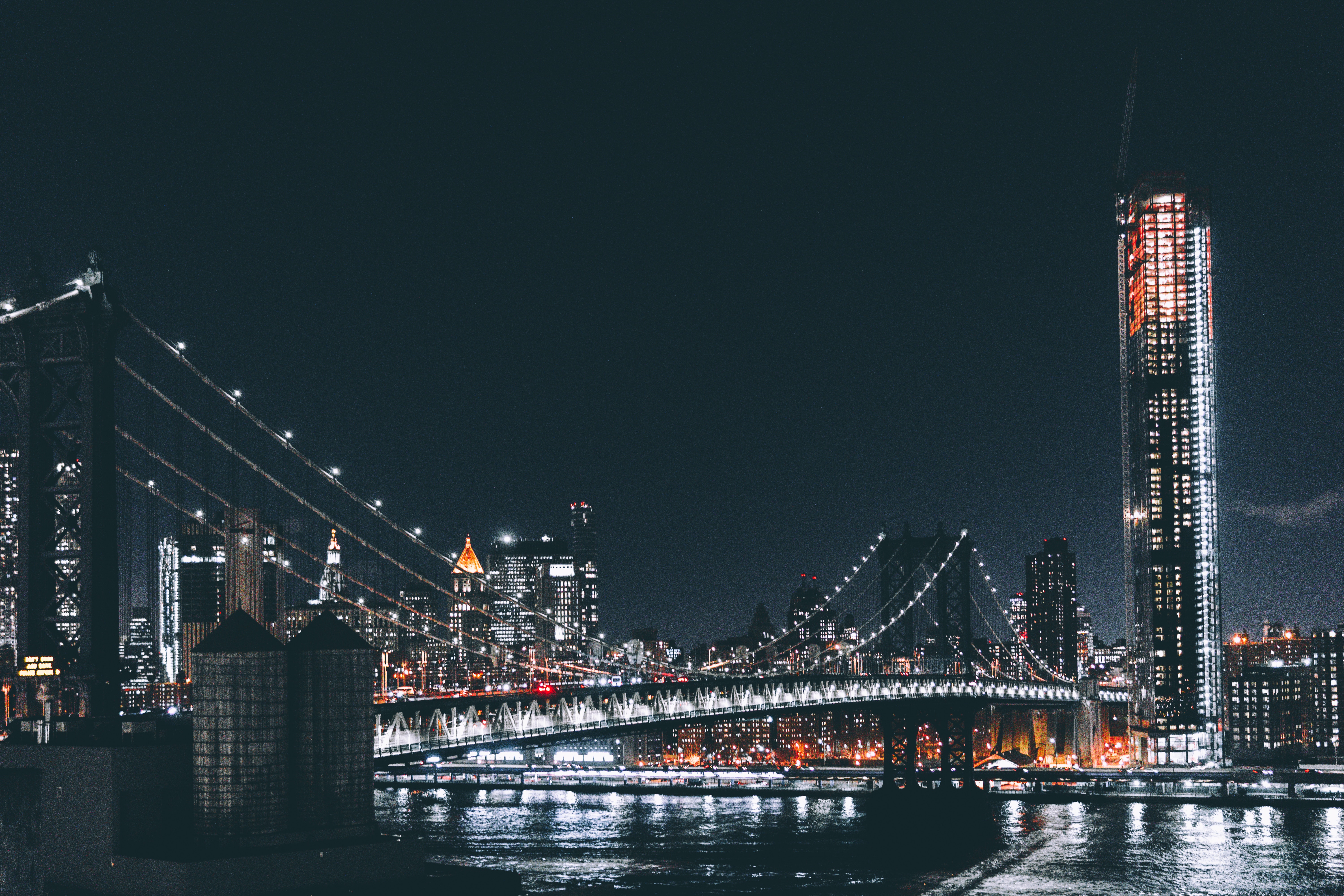 Manhattan Bridge and skyline at night HD Wallpaper