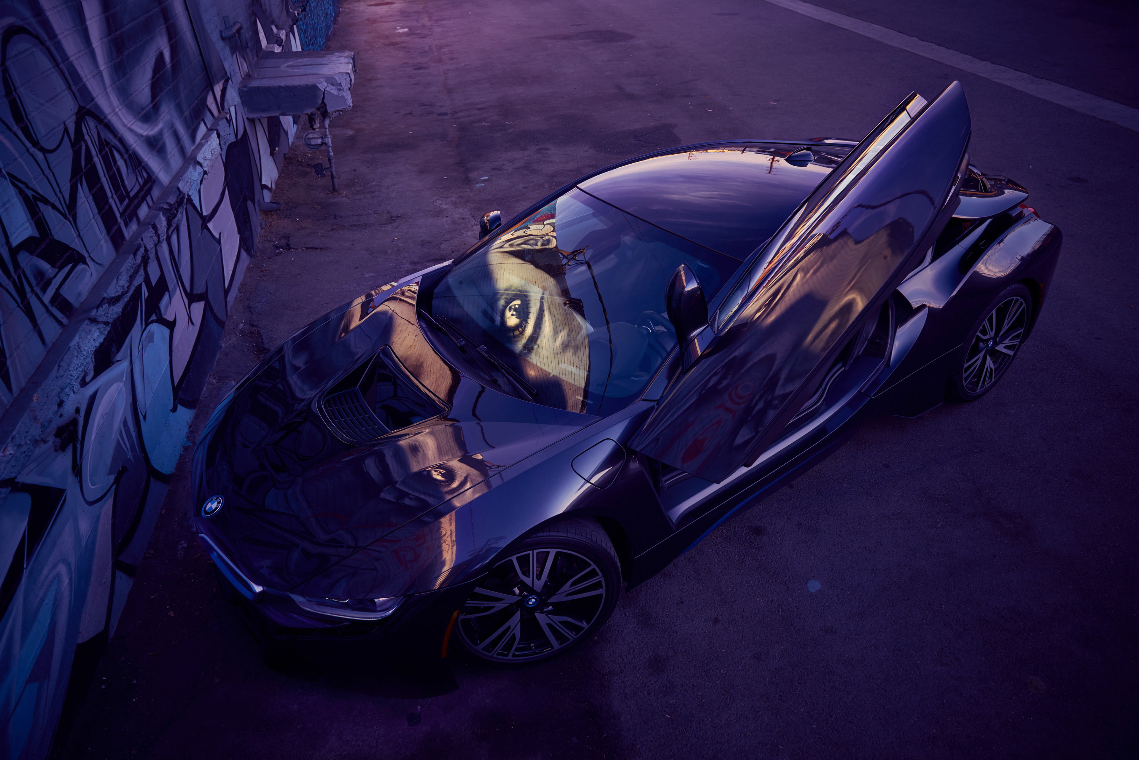 BMW i8 with butterfly doors open and graffiti wall HD Wallpaper