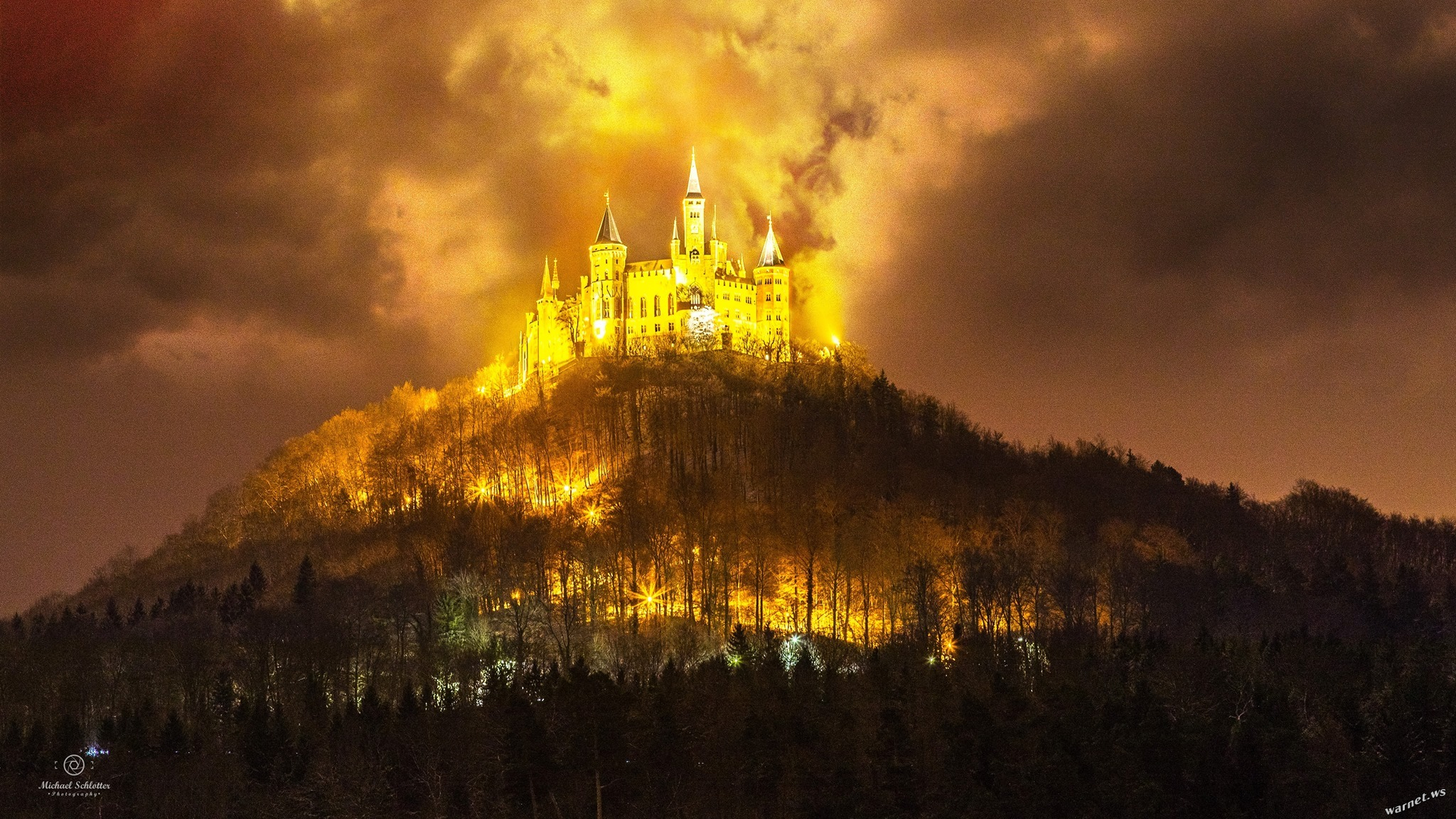 Hohenzollern Castle illuminated at night in Germany HD Wallpaper