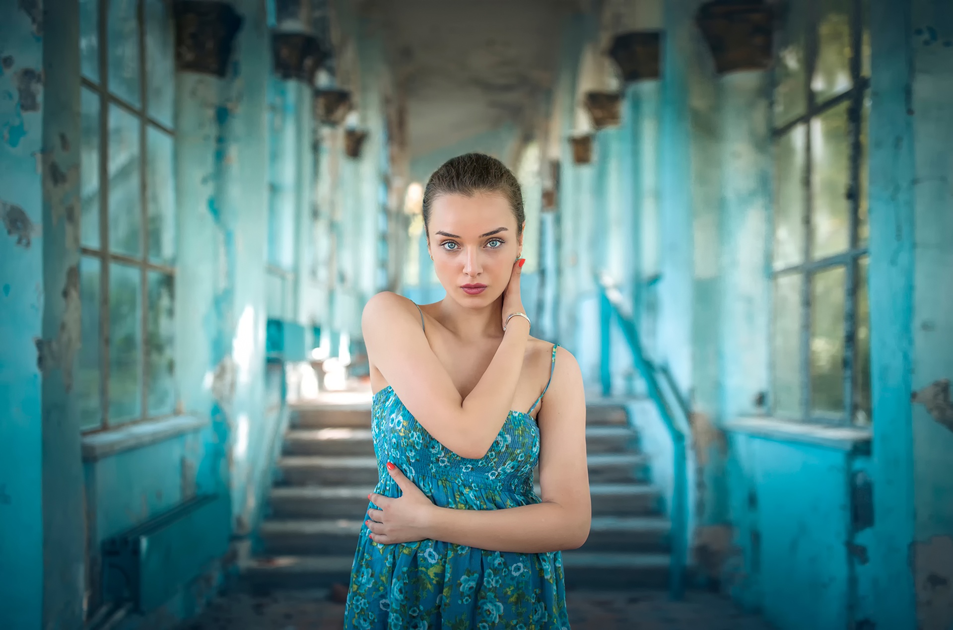 Woman in blue dress in abandoned building HD Wallpaper