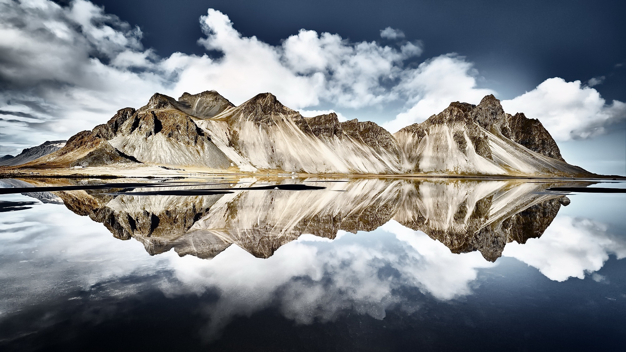 Mountains reflecting in water in Iceland HD Wallpaper