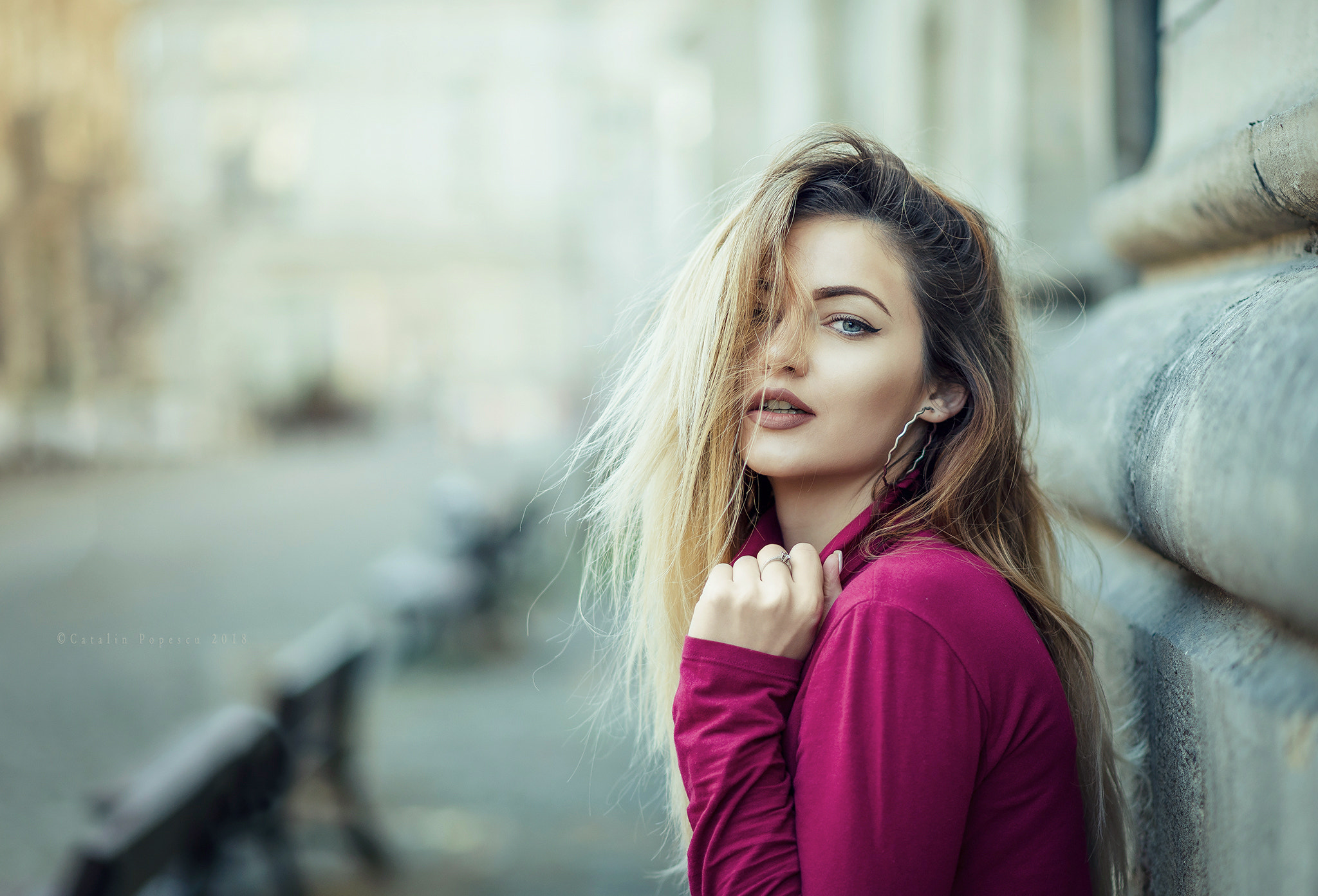 Woman with blonde hair and blue eyes outdoors HD Wallpaper