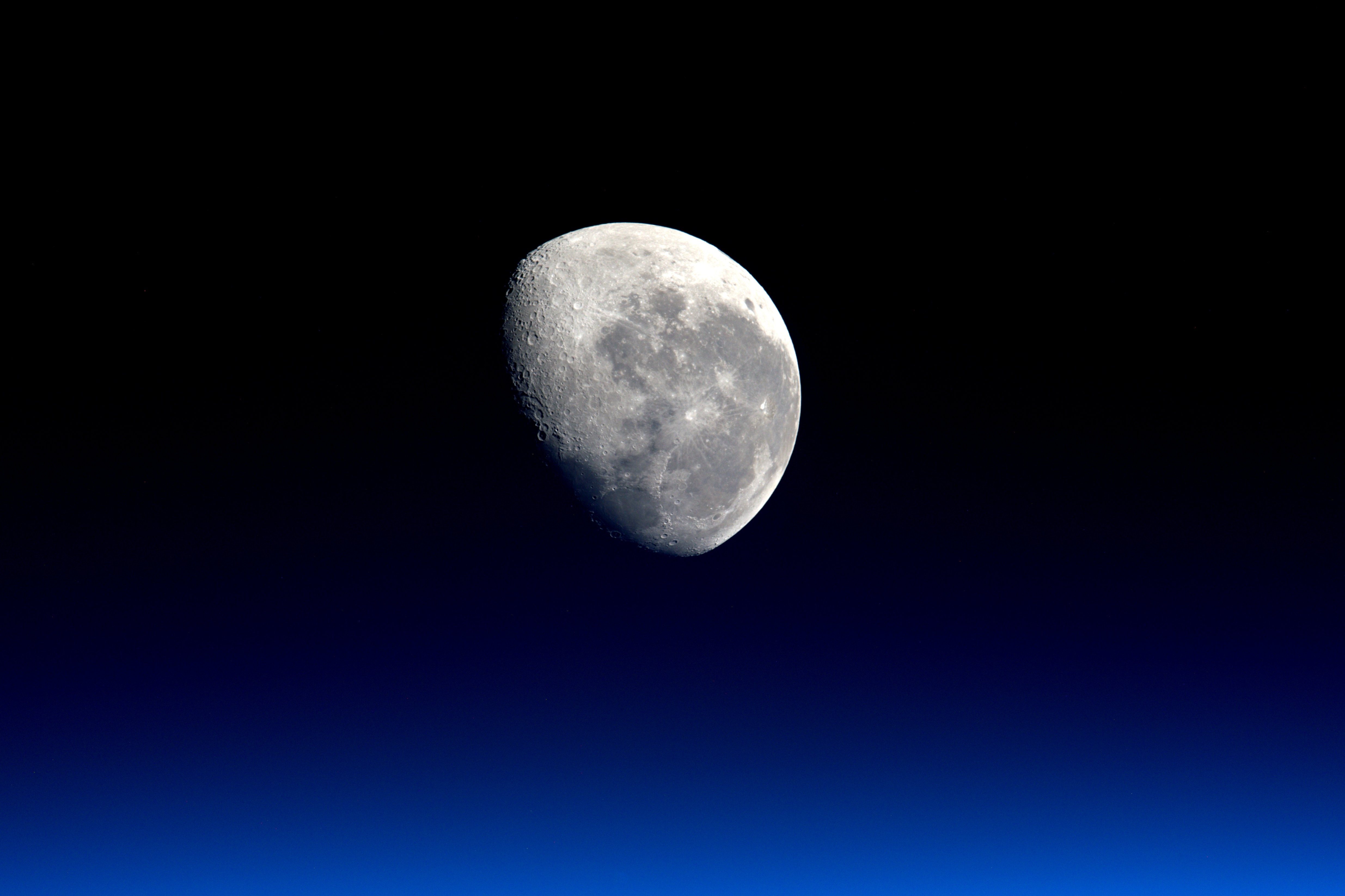 The Moon from Space with Earth's Atmosphere HD Wallpaper
