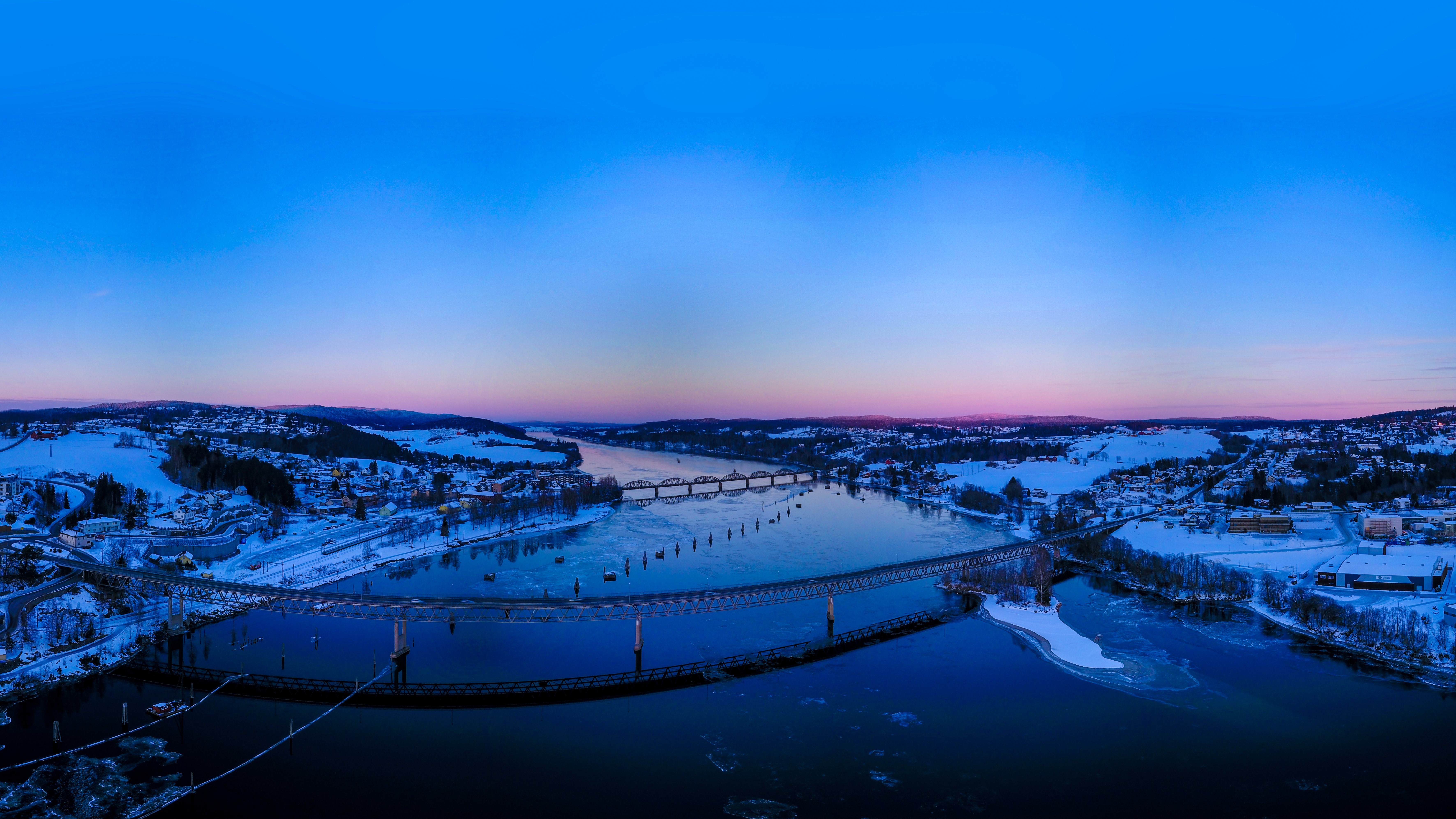 Winter sunset over a river with bridges in Norway HD Wallpaper