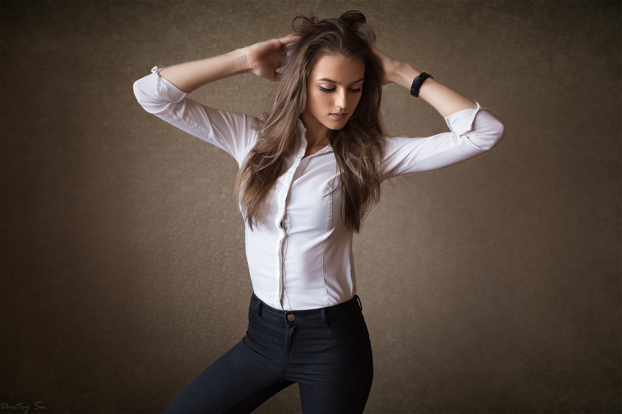 Woman with hands on head in white shirt HD Wallpaper