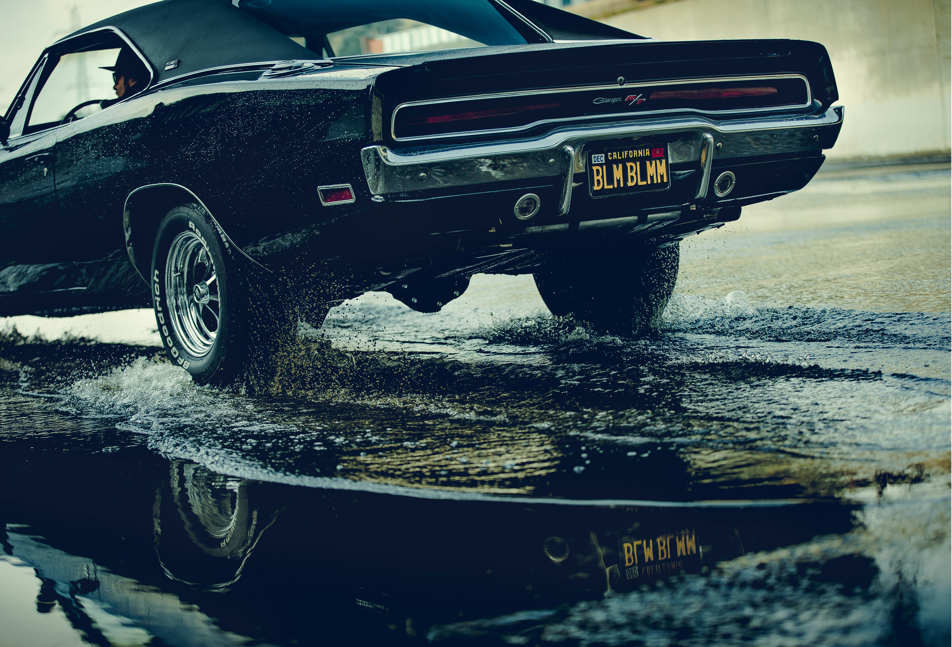 Black Dodge Charger driving through water HD Wallpaper