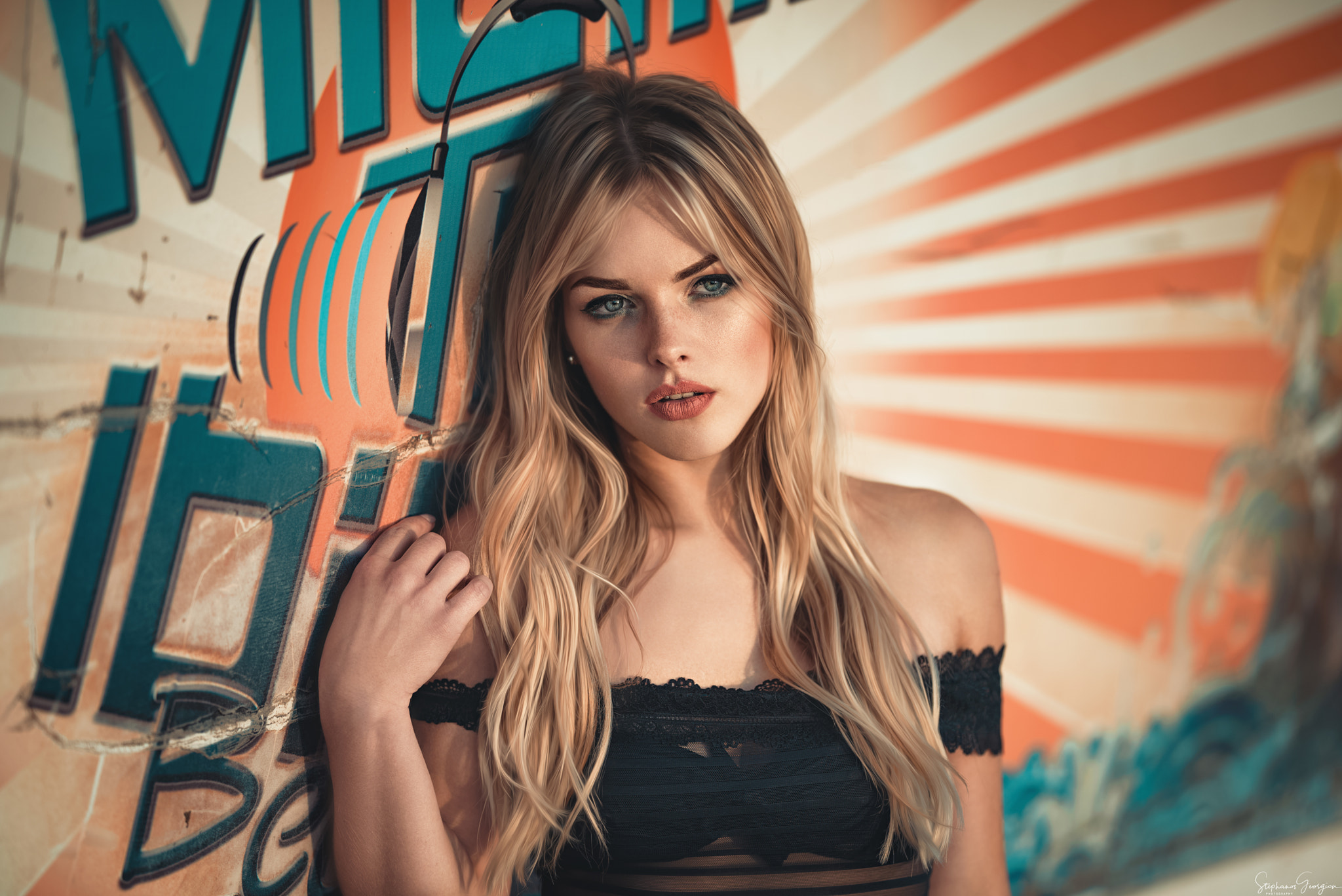 Woman with blonde hair wearing a black top HD Wallpaper