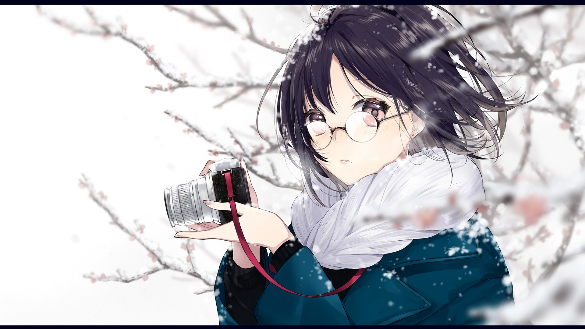 Girl with glasses holding a camera in the snow HD Wallpaper