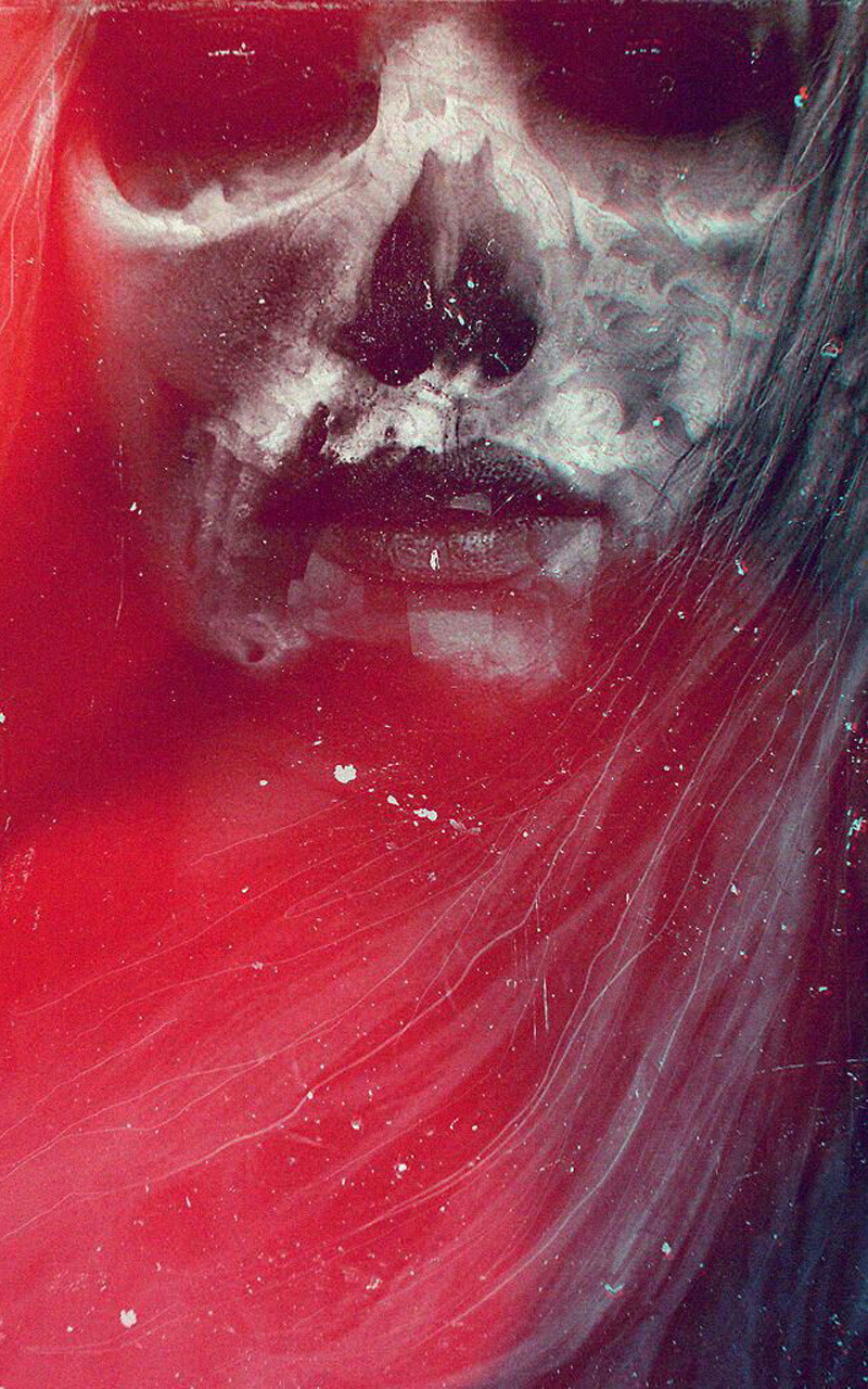Close-up of a skull-like face with red background HD Wallpaper