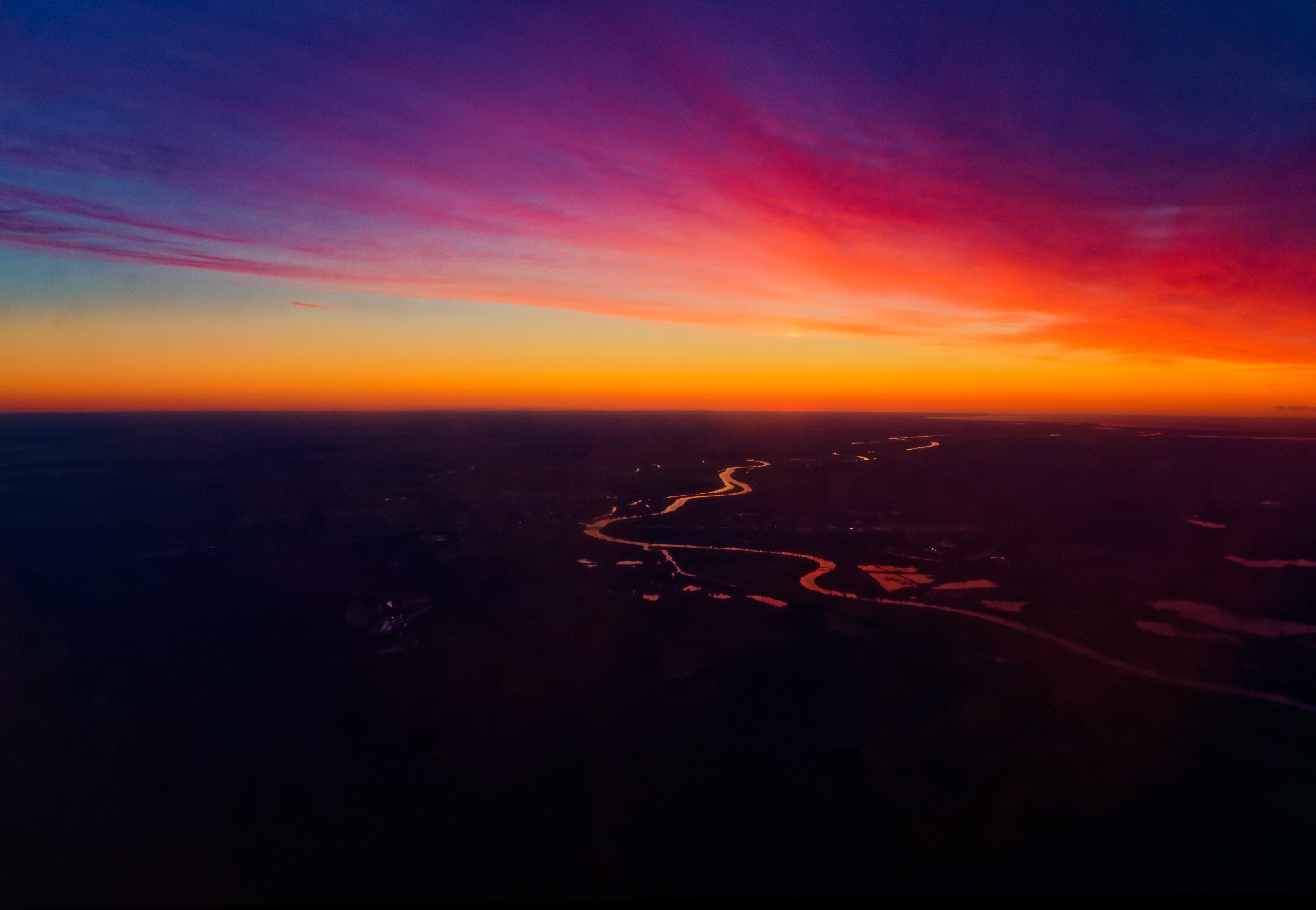 Colorful sunset over a winding river and landscape HD Wallpaper