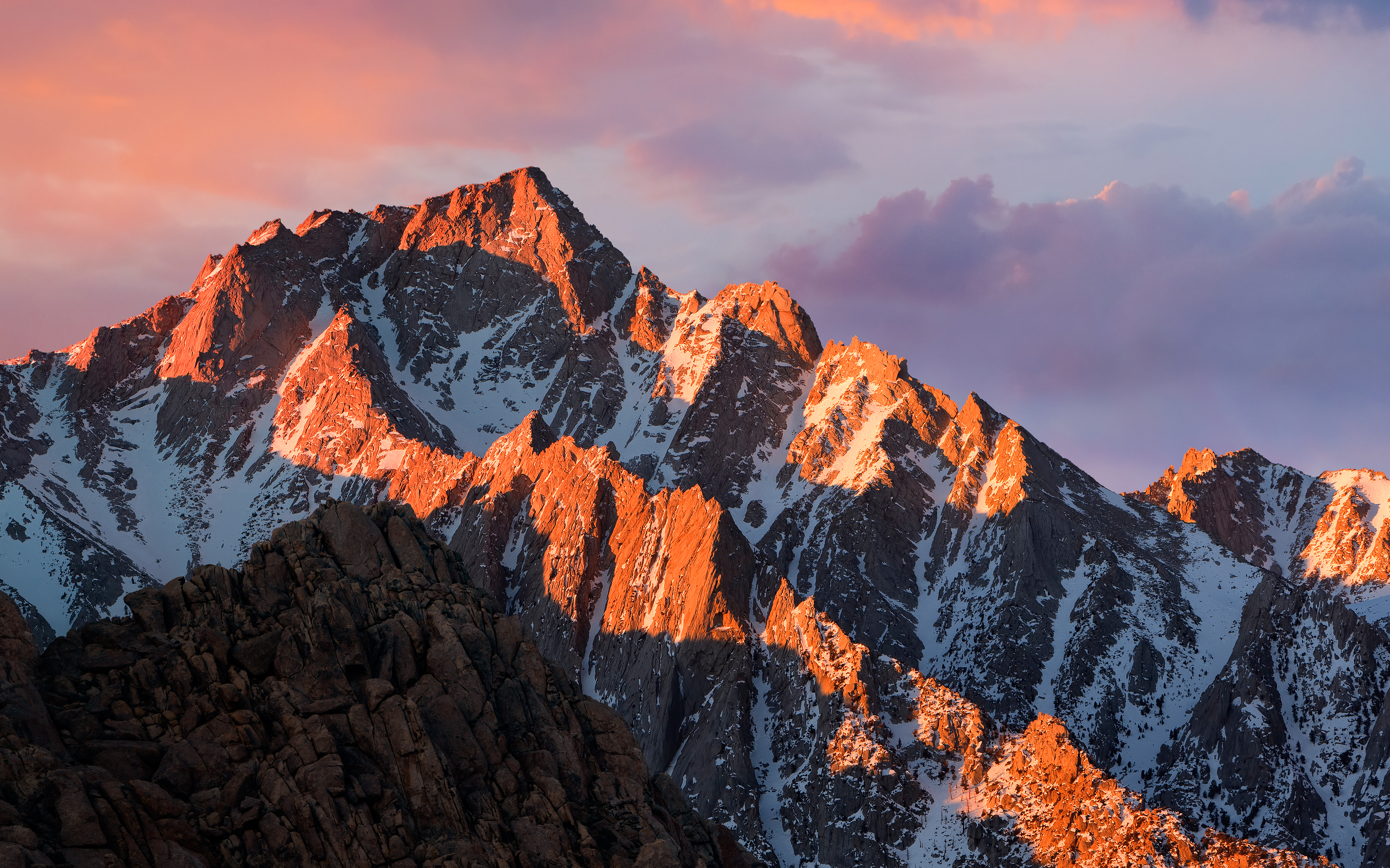 Snowy mountain peaks at sunset with clouds HD Wallpaper