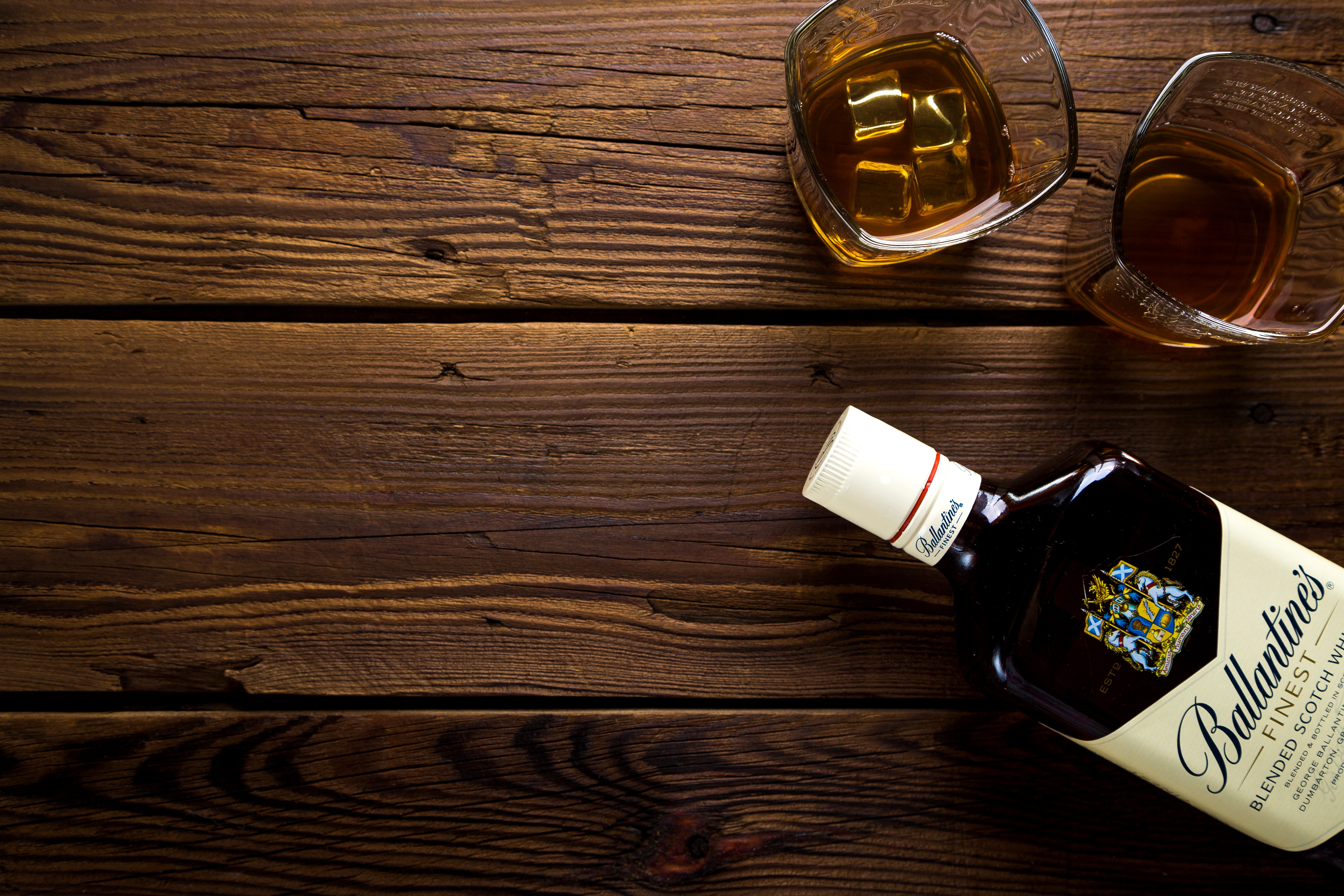 Ballantine's Finest Scotch Whisky bottle and glasses HD Wallpaper