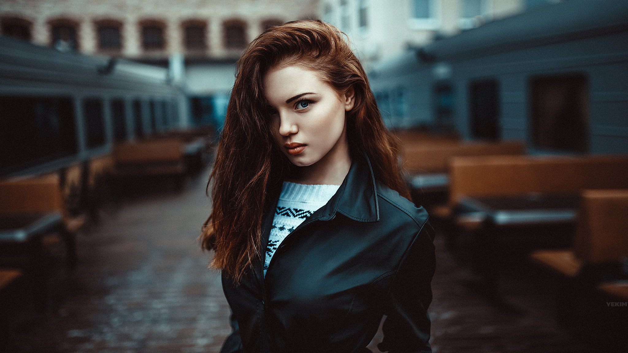 Portrait of a woman with auburn hair wearing a leather jacket HD Wallpaper