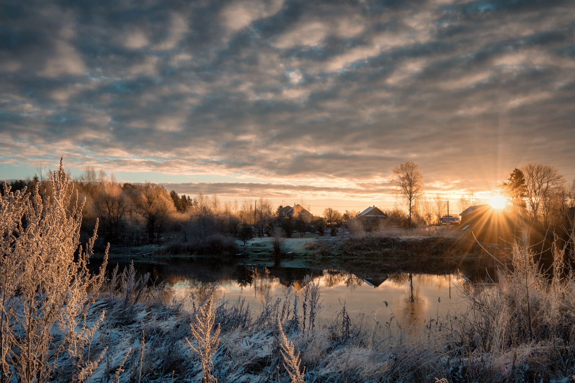 Winter sunrise over a frozen river with houses HD Wallpaper