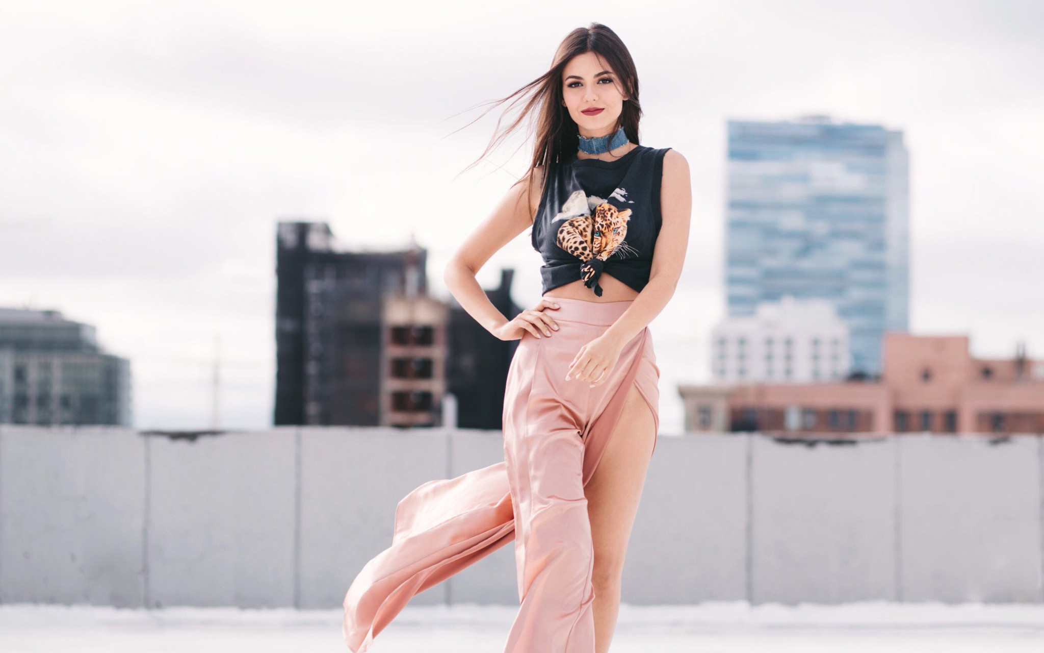 Victoria Justice posing on a rooftop HD Wallpaper