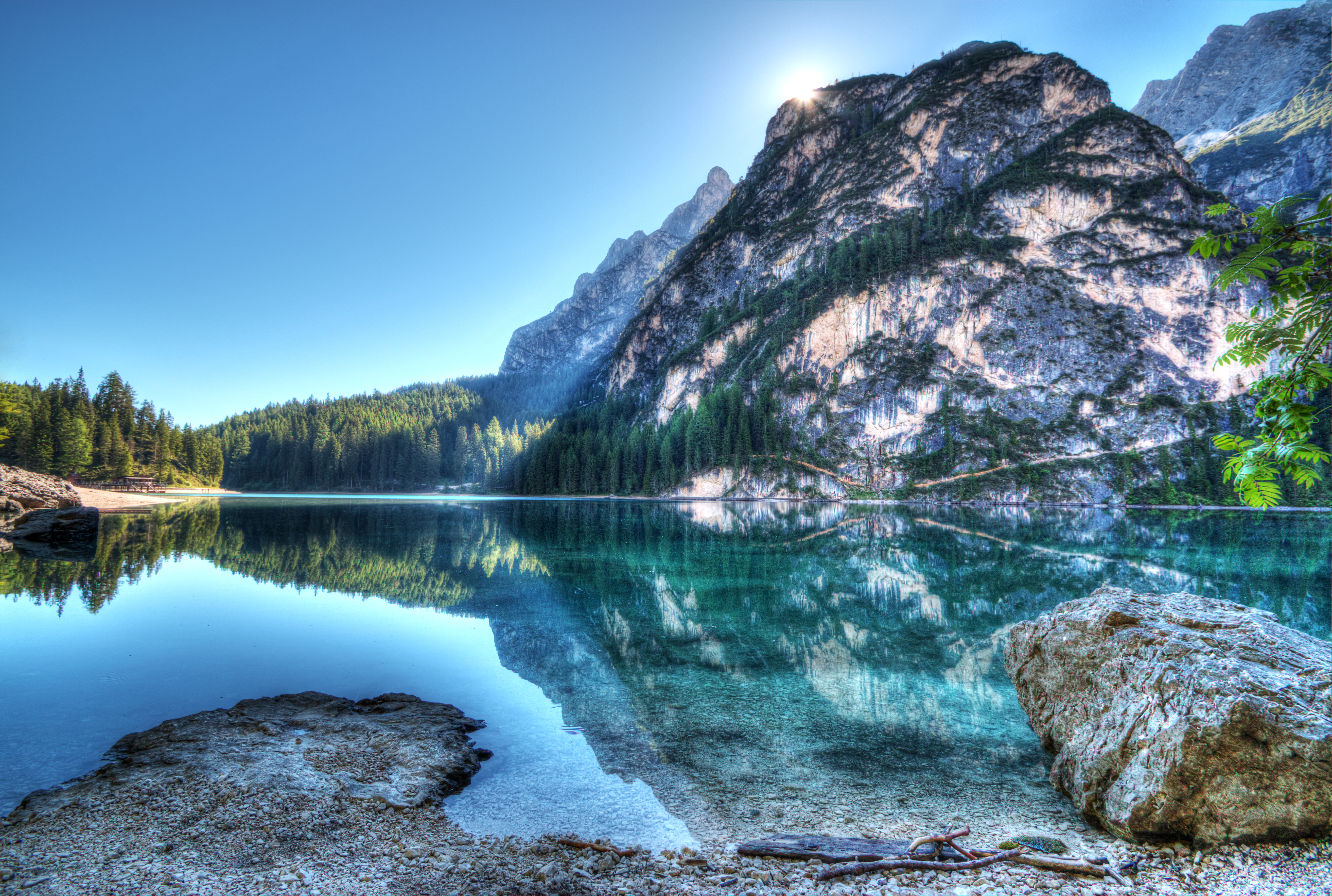 Lake and mountains with sun shining HD Wallpaper