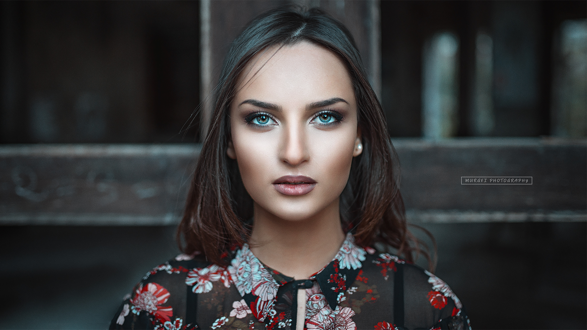 Woman with blue eyes and floral shirt HD Wallpaper