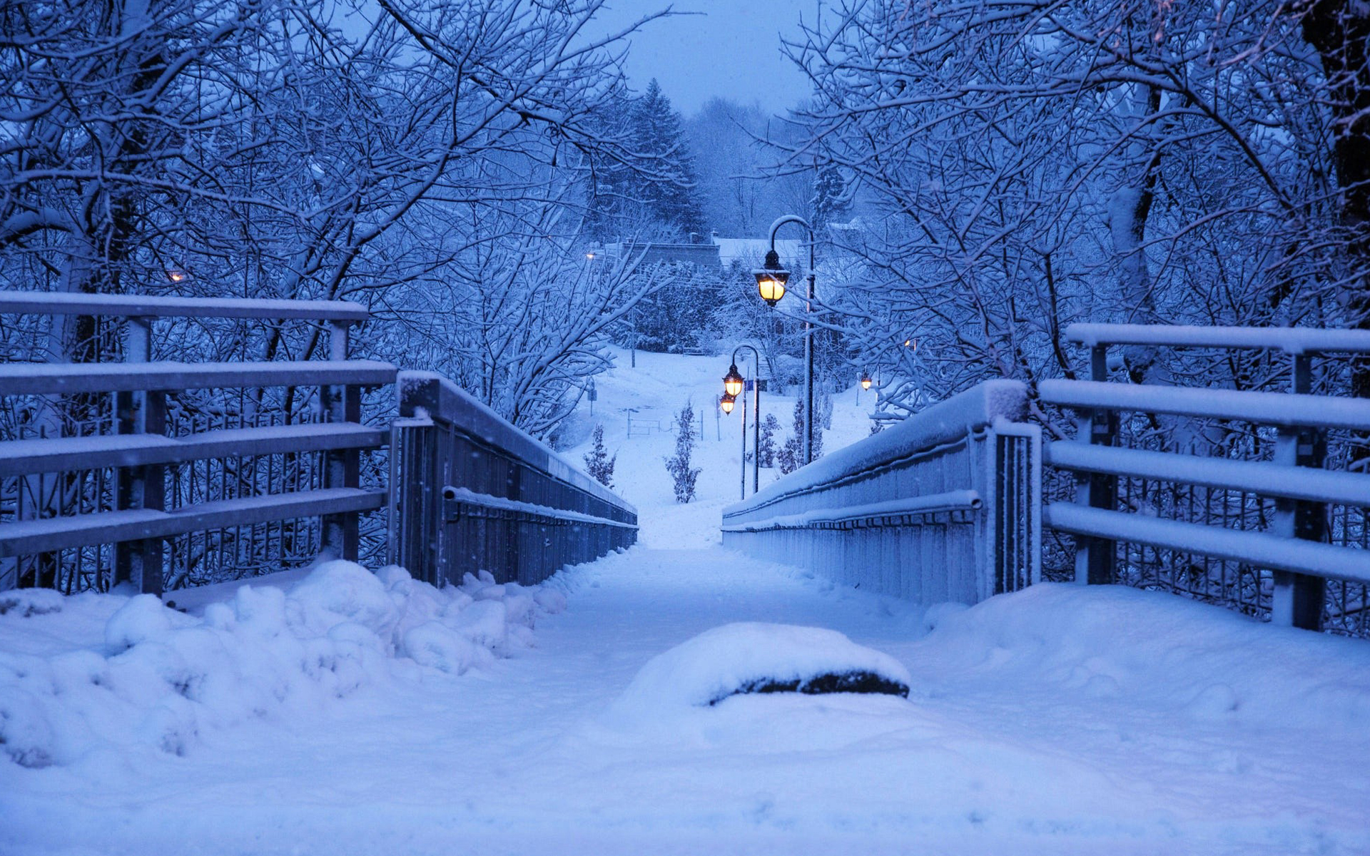 Snow covered bridge with lanterns in winter HD Wallpaper