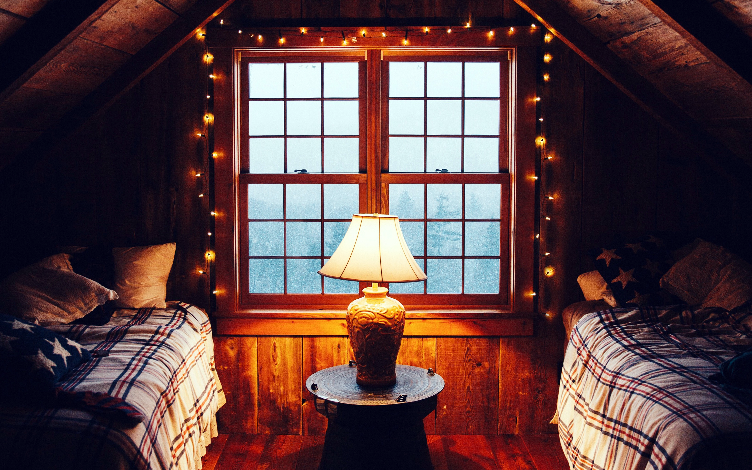 Cozy cabin interior with beds and window HD Wallpaper