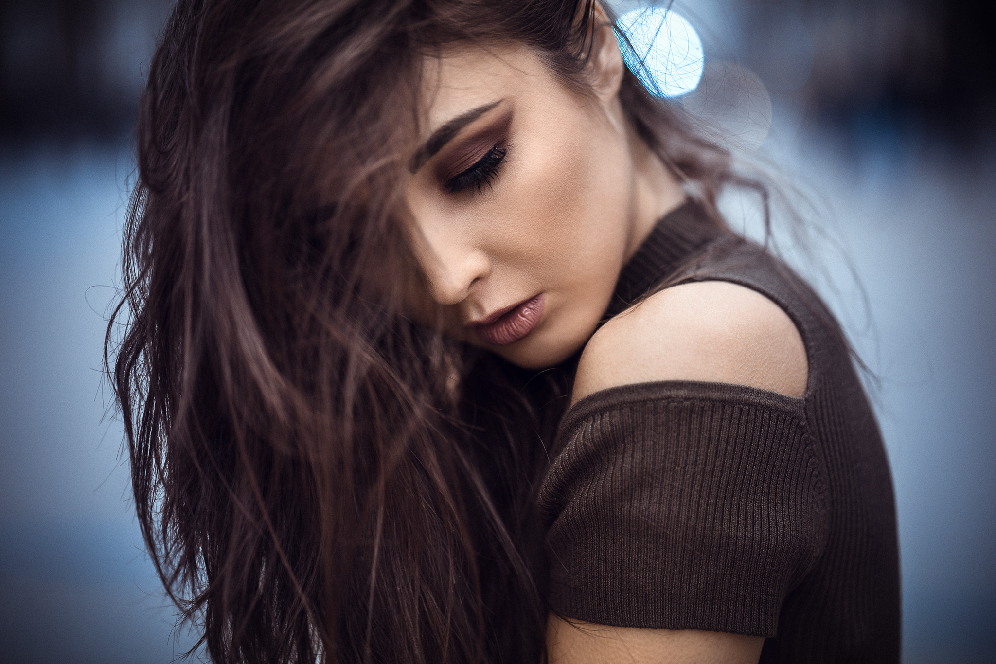 Woman with long brown hair and makeup HD Wallpaper