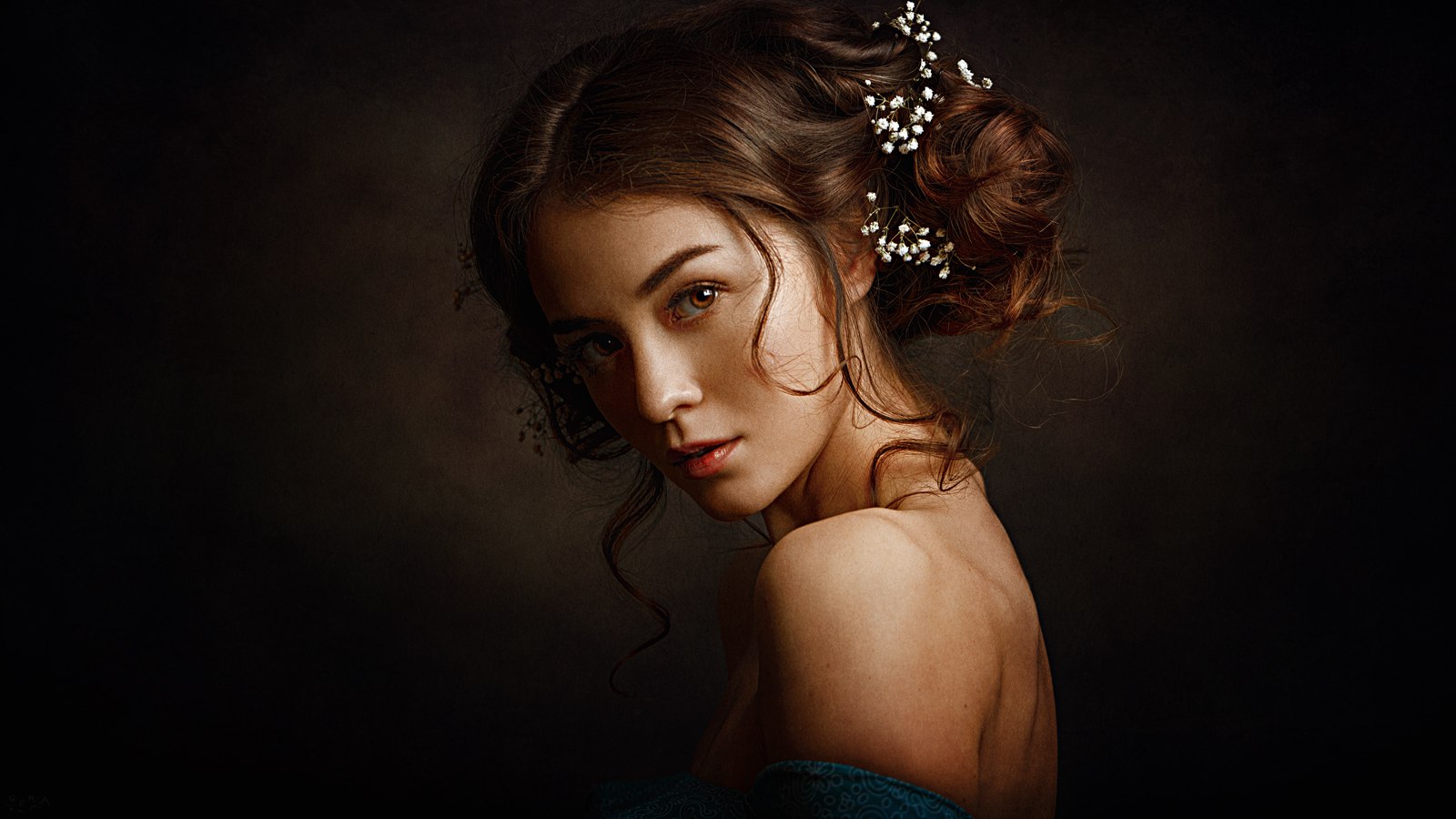 Portrait of a woman with flowers in her hair HD Wallpaper