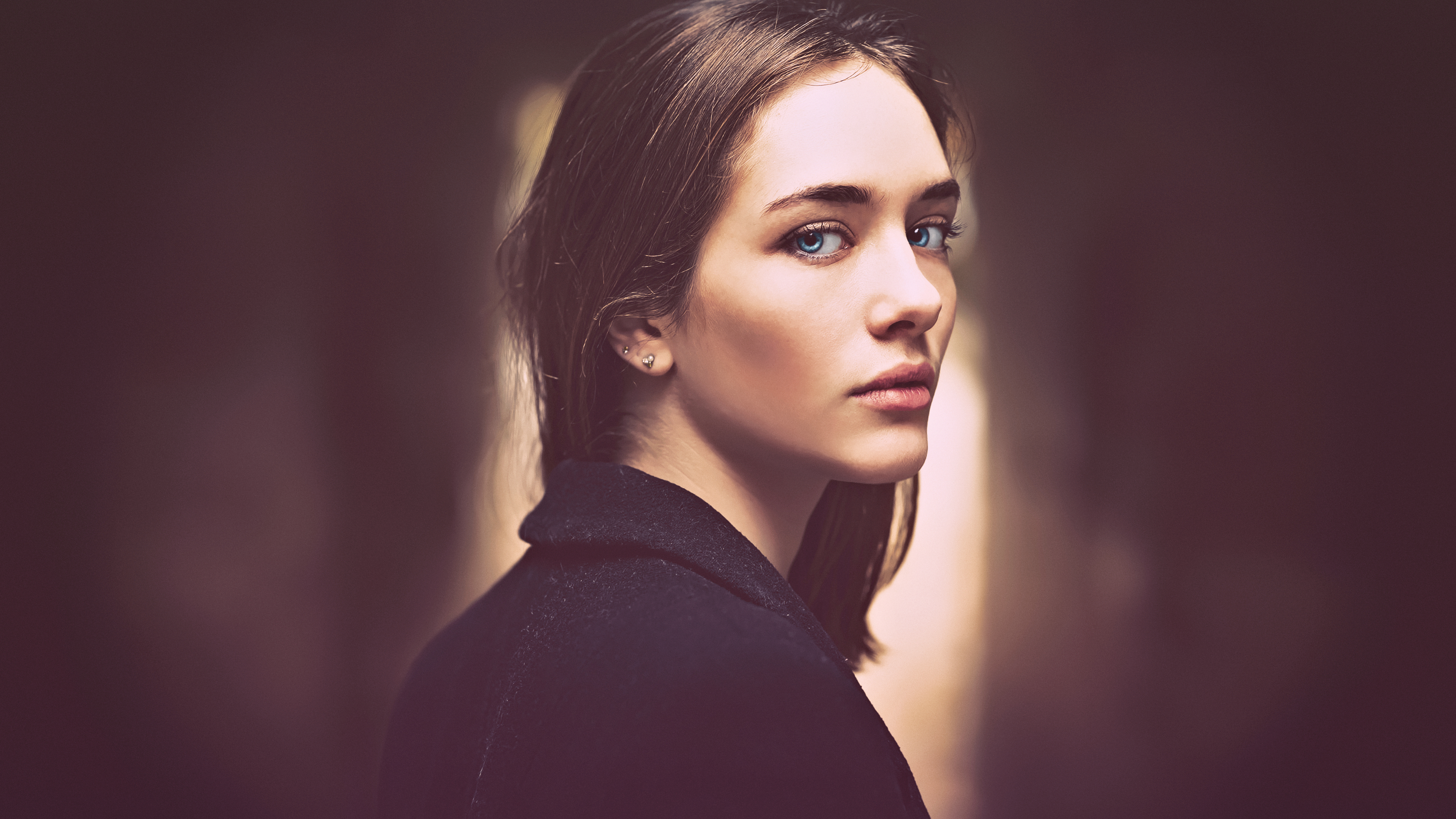 Woman with blue eyes wearing a black coat HD Wallpaper