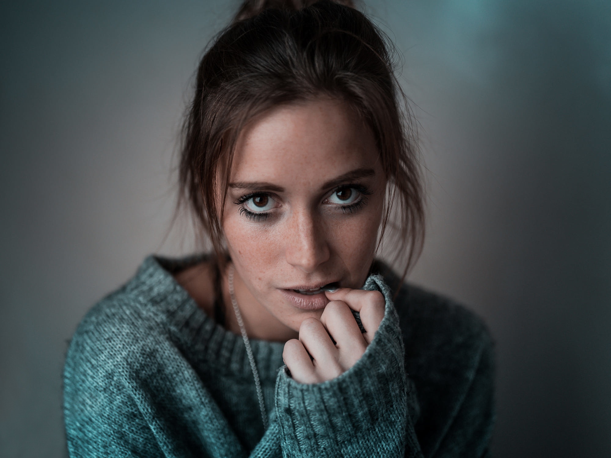 Woman in a grey sweater HD Wallpaper