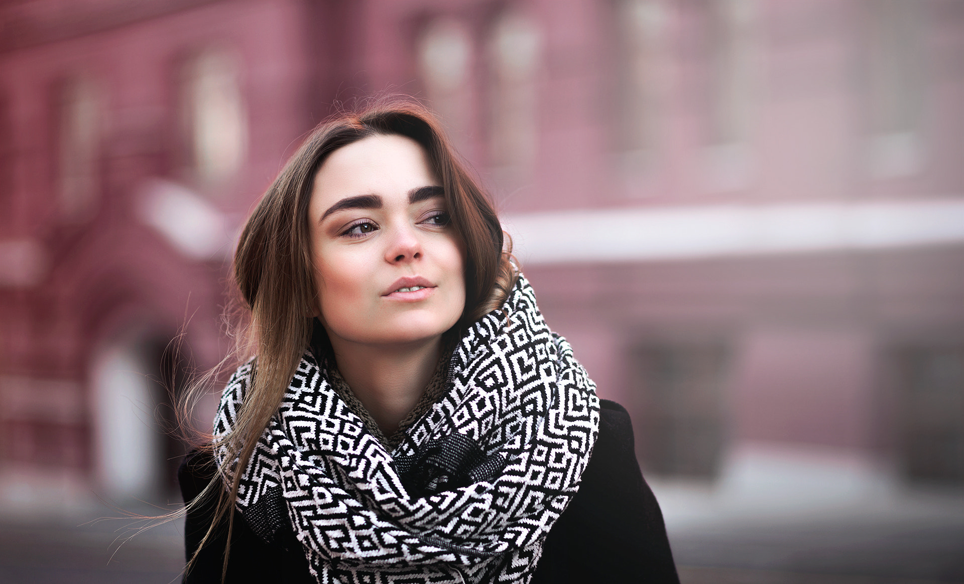 Woman with scarf in front of building HD Wallpaper