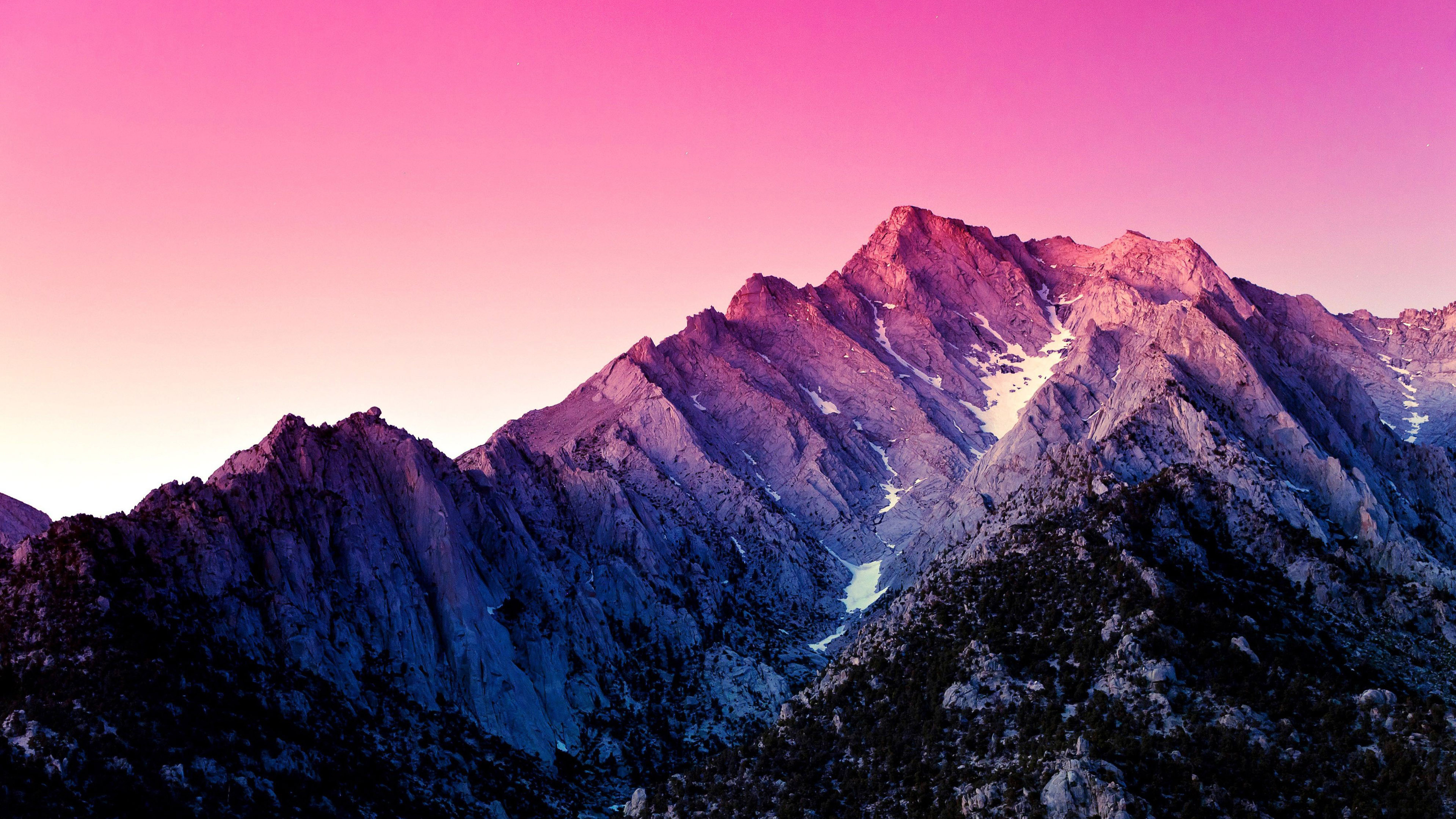 Mountain range at sunset with pink sky HD Wallpaper