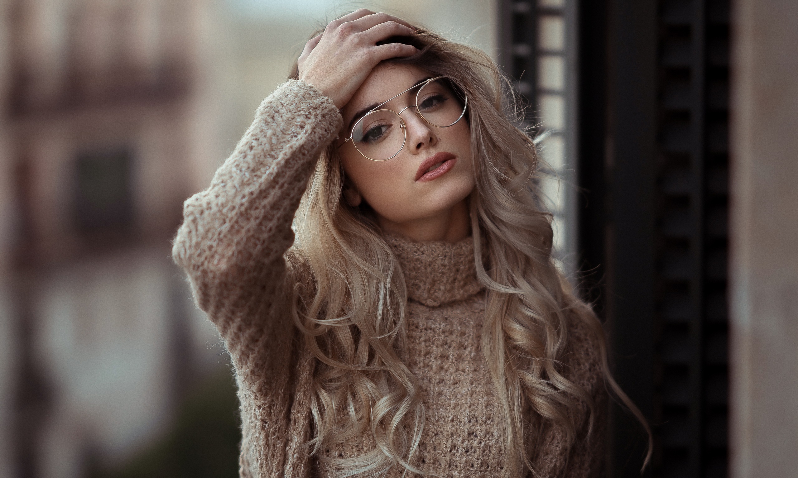 Woman with blonde hair and glasses wearing a sweater HD Wallpaper