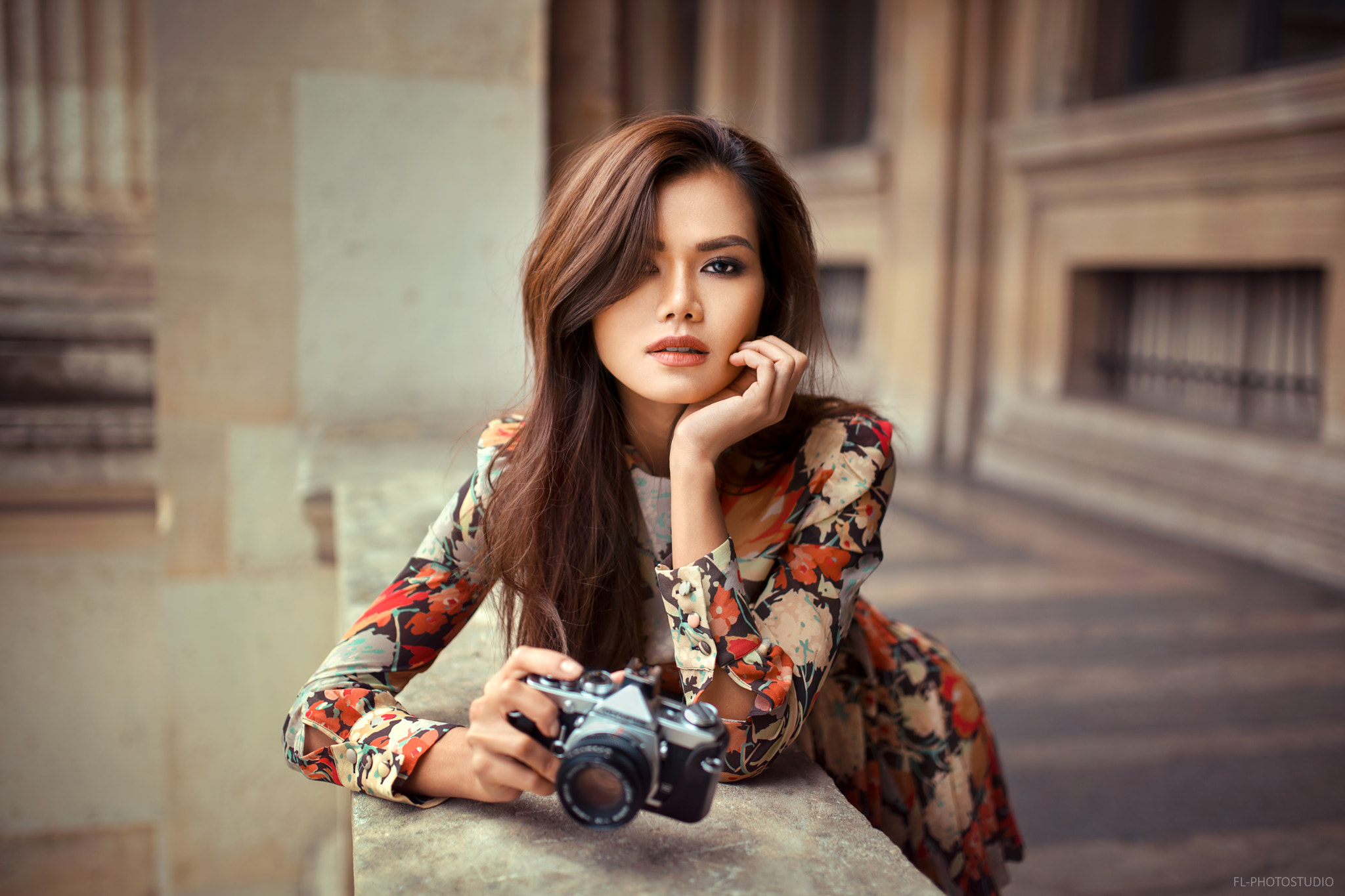 Asian woman with camera in floral dress HD Wallpaper