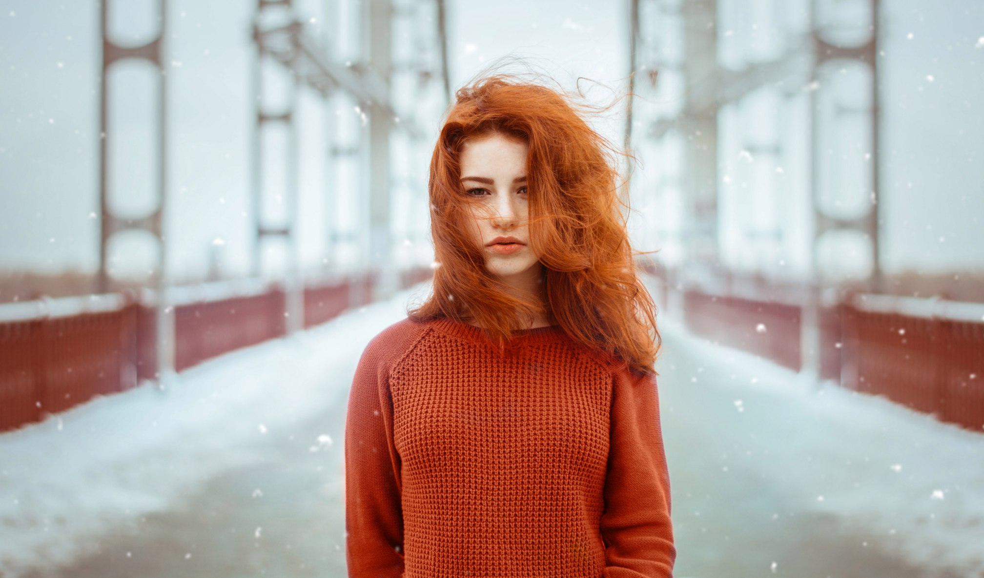 Redhead woman on a snowy bridge HD Wallpaper