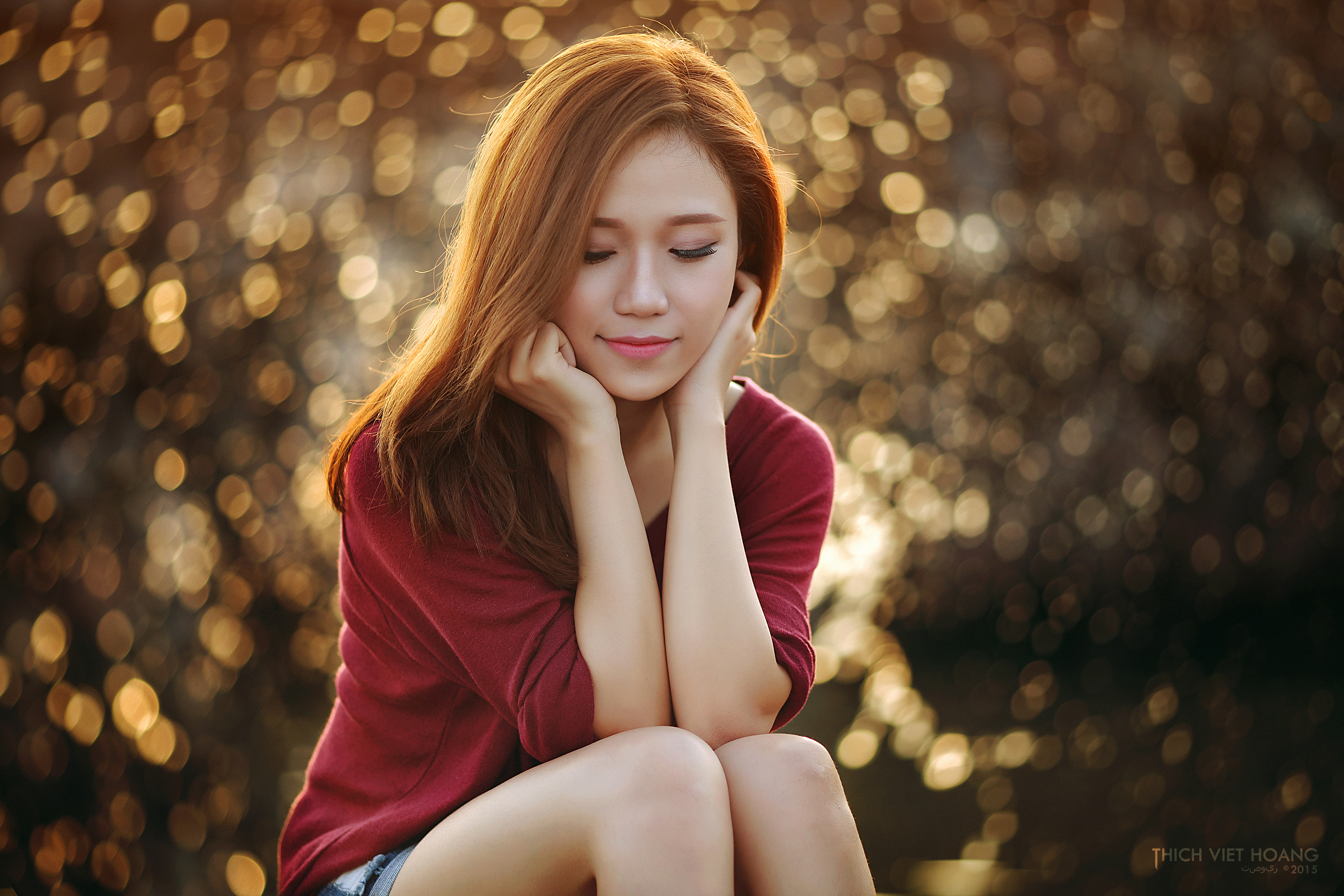 Young Asian woman with auburn hair wearing a maroon shirt HD Wallpaper