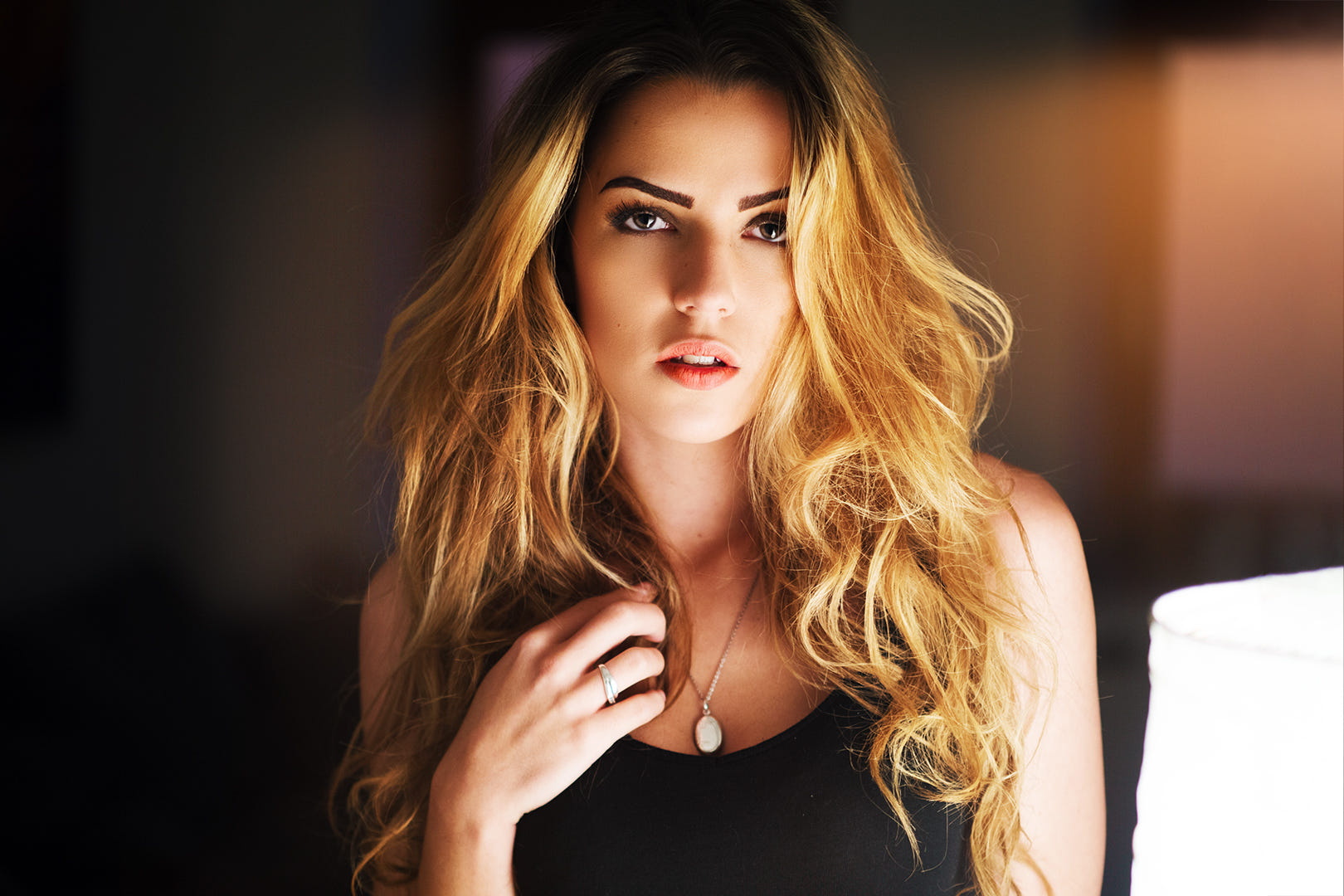 Woman with long blonde hair wearing a black top HD Wallpaper