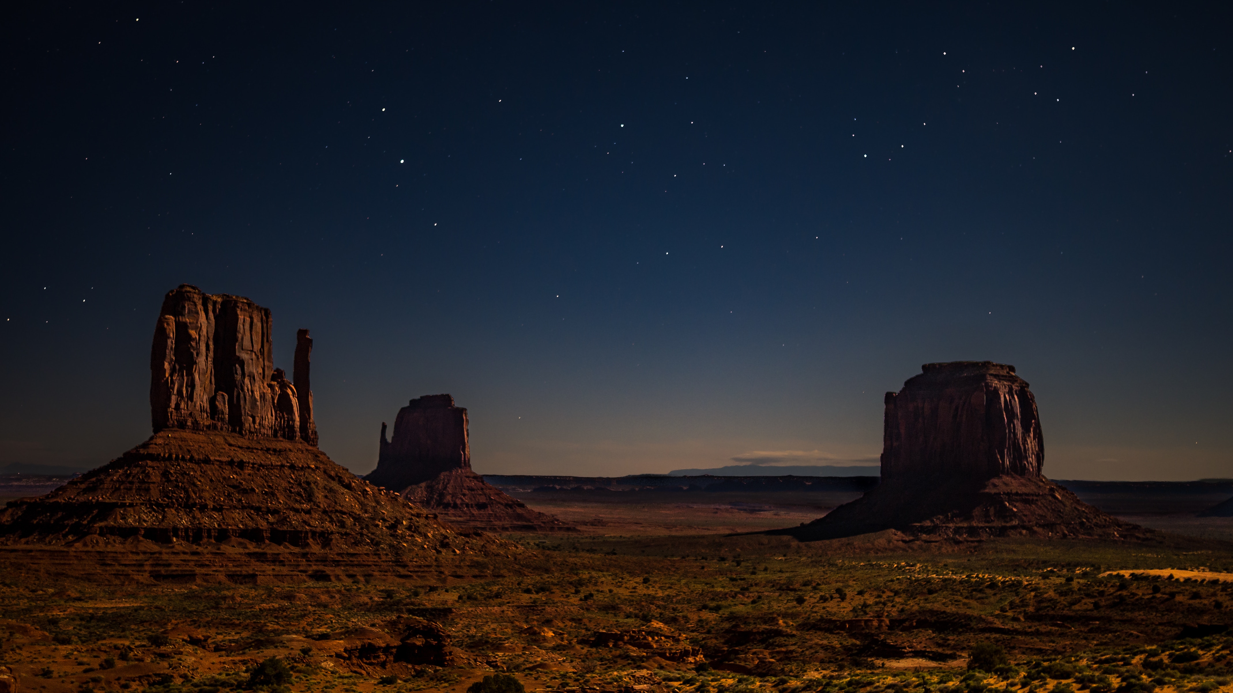Monument Valley at night with stars HD Wallpaper