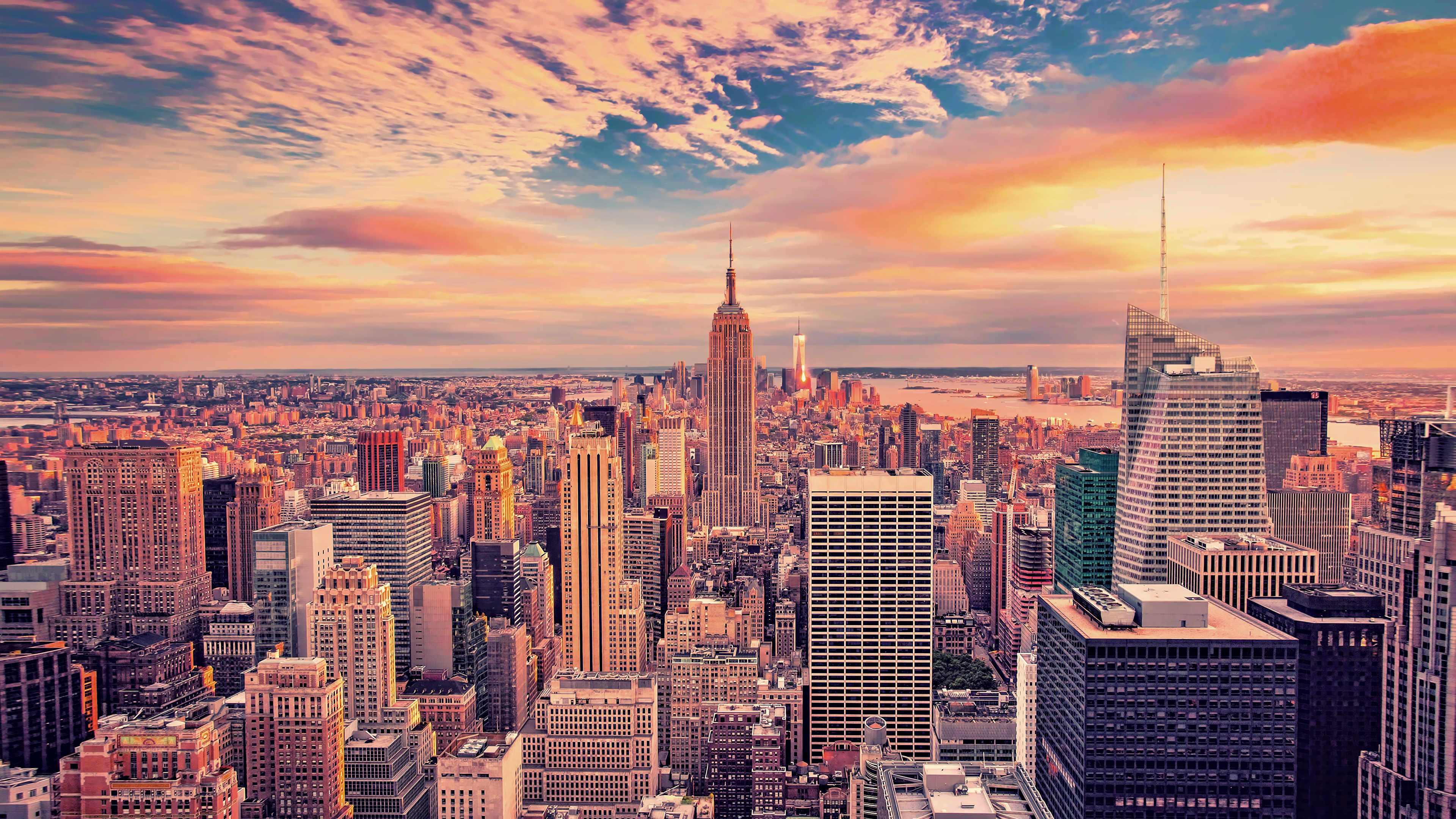 New York City skyline at sunset with Empire State Building HD Wallpaper
