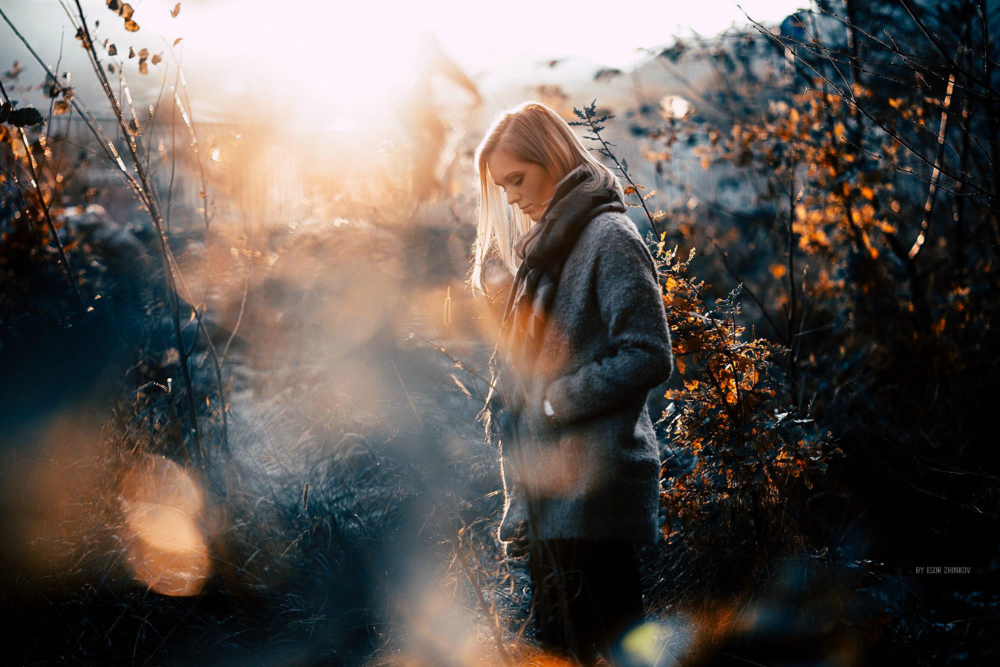 Woman in grey coat in nature during sunset HD Wallpaper