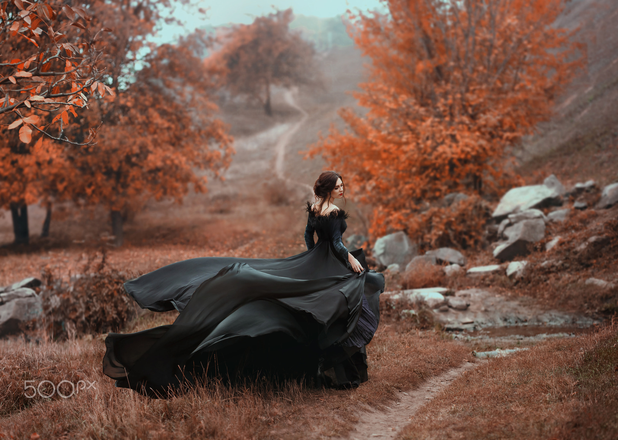 Woman in black dress in fall nature HD Wallpaper